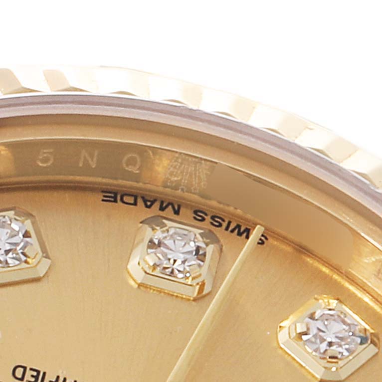 The image shows a close-up view of the dial and diamond hour markers of a Rolex President 179178 Women
s Yellow Gold Champagne Dial 179178 Women
s Yellow Gold Champagne Dial model watch.