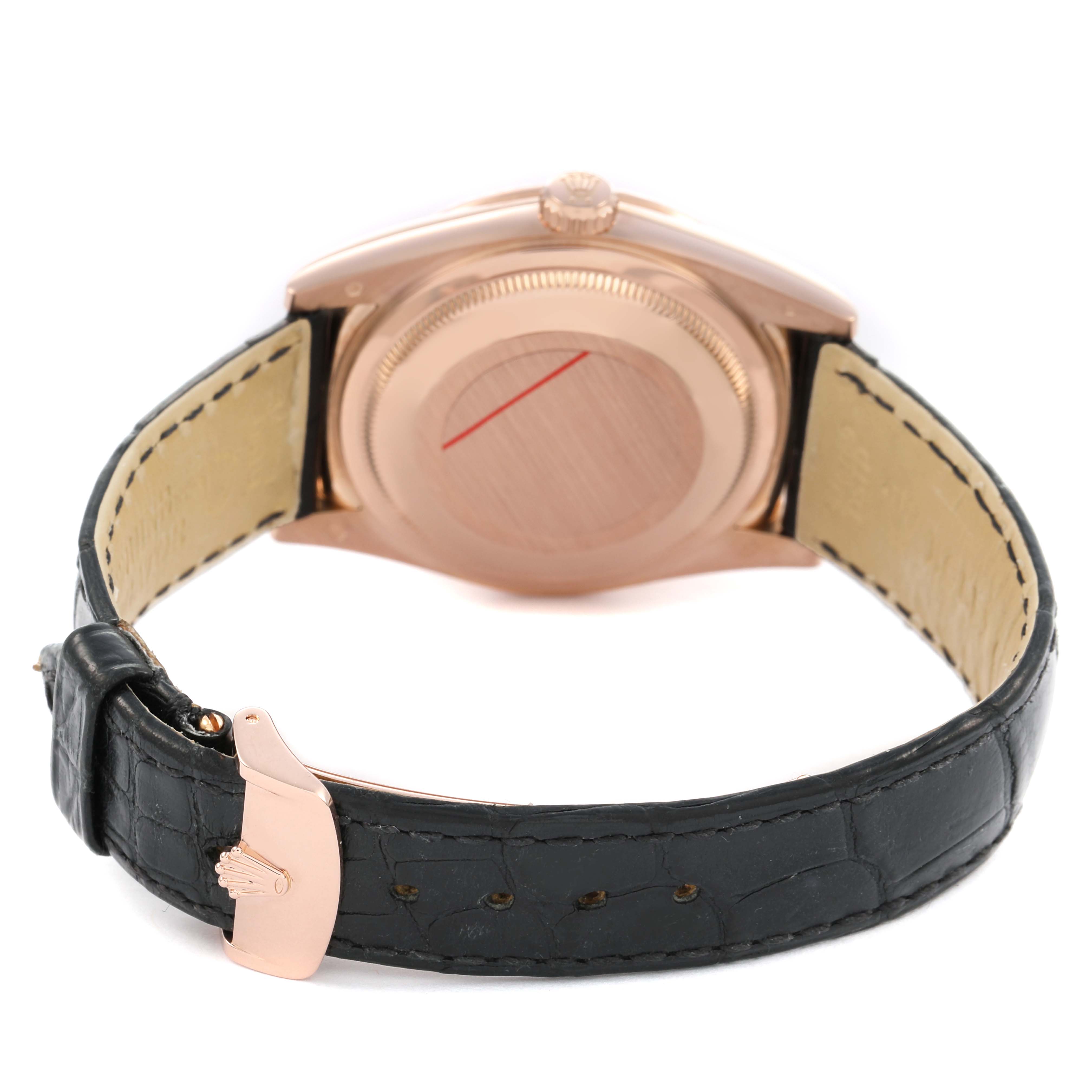 The image shows the back of a Rolex President 118135 Men's Rose Gold Silver Dial watch, highlighting the case back and leather strap, with the clasp visible.