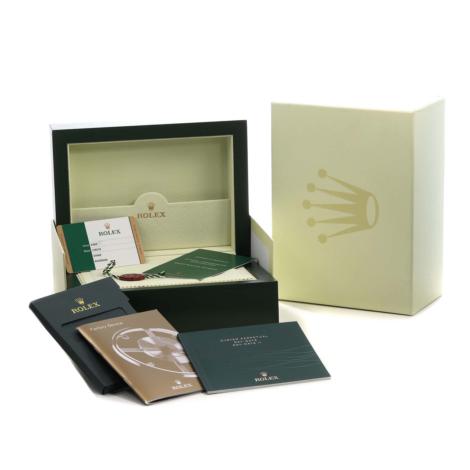 The image shows the packaging, booklets, and warranty card for a Rolex President 118135 Men's Rose Gold Silver Dial model, arranged neatly with the inner and outer boxes.