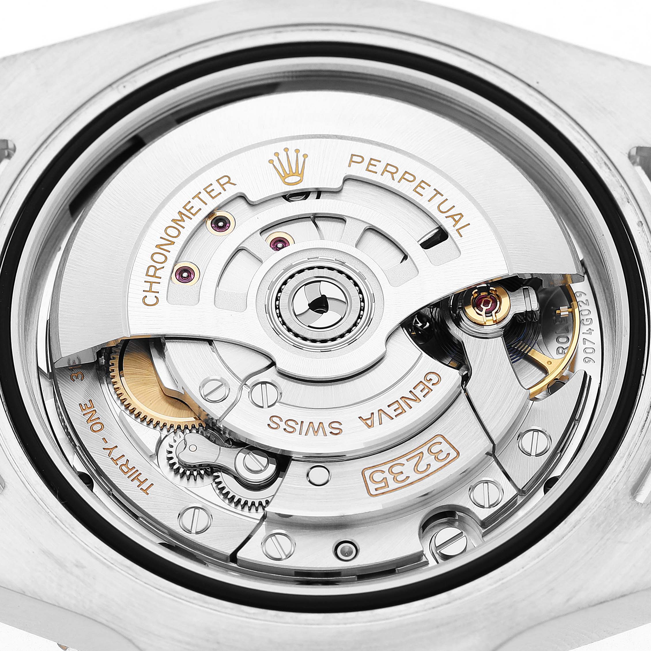 The image shows the intricate movement of a Rolex Submariner 126613LN Men's Steel and Gold (two tone) Black Dial with emphasis on the rotor and gears.