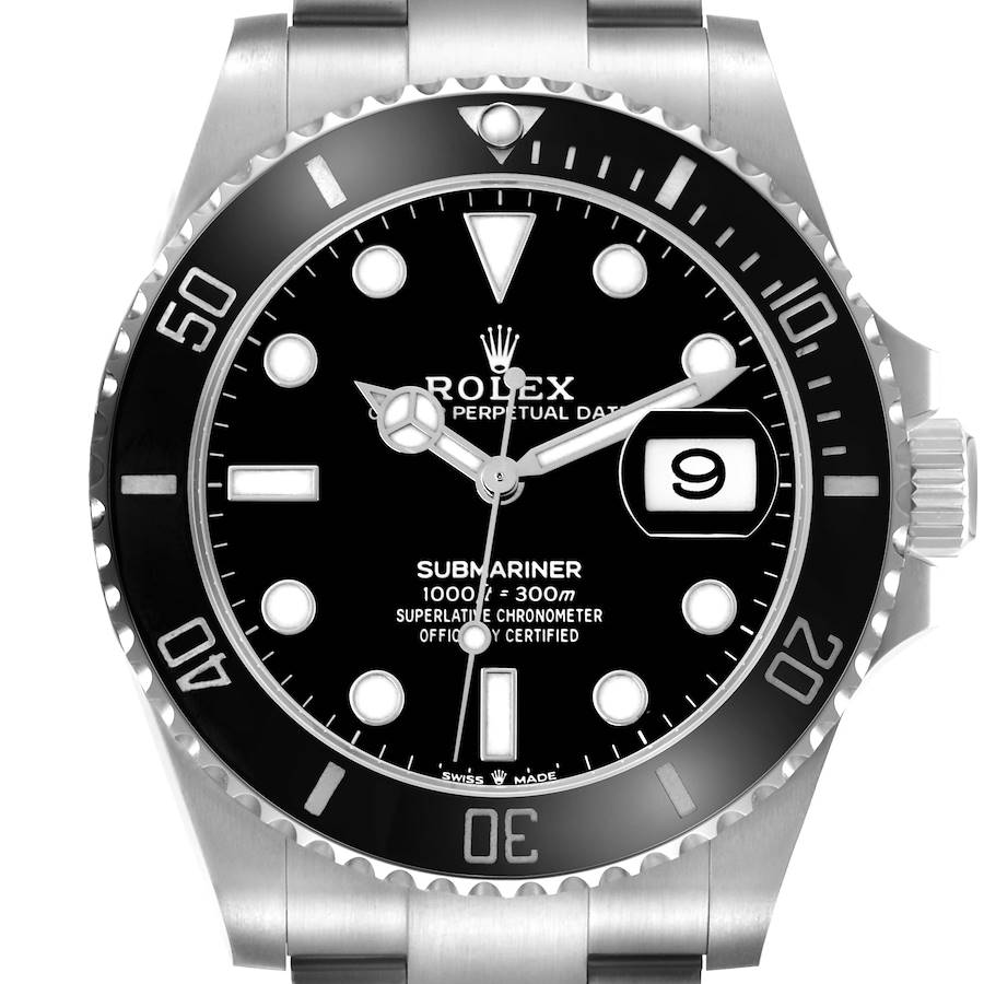 The image shows a Rolex Submariner watch face from a front angle, highlighting the dial, hands, bezel, and date window.