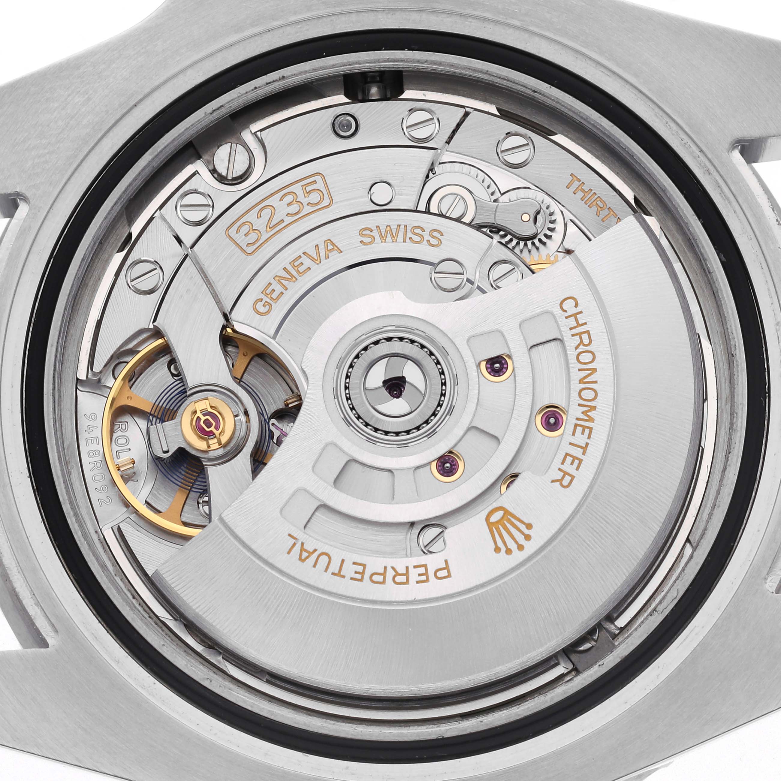 The image shows the movement of a Rolex Submariner 126610 Men
s Stainless Steel Black Dial 126610 Men
s Stainless Steel Black Dial watch, highlighting its intricate mechanical components from the back.