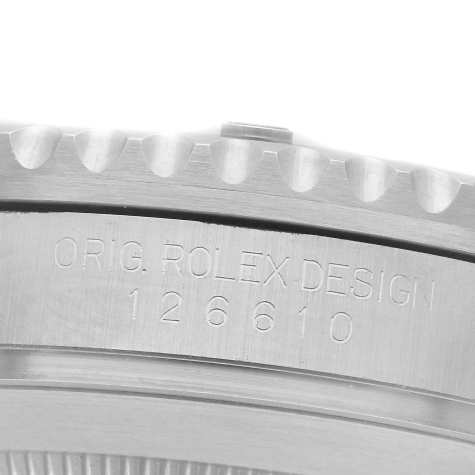 The image shows a close-up of the case side of a Rolex Submariner 126610 Men
s Stainless Steel Black Dial 126610 Men
s Stainless Steel Black Dial with engraved design details.