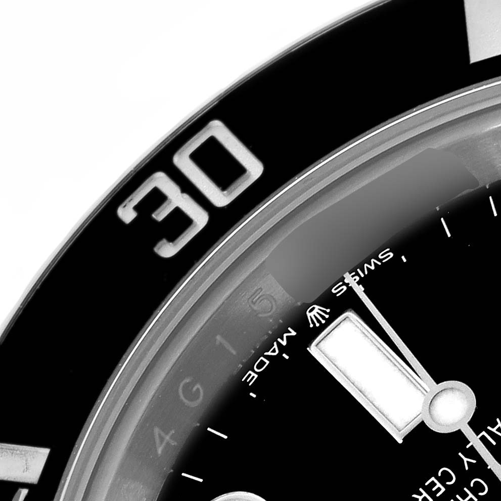 The image shows a close-up of the bezel and part of the dial of a Rolex Submariner 126610 Men
s Stainless Steel Black Dial 126610 Men
s Stainless Steel Black Dial watch, highlighting the "30" mark and hands.