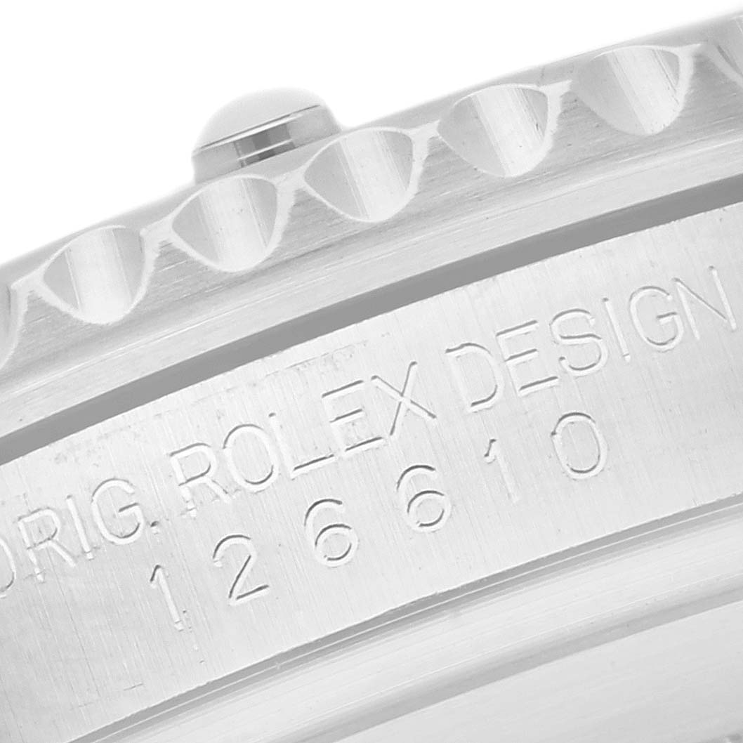 The image shows a close-up of the Rolex Submariner 126610 Men
s Stainless Steel Black Dial 126610 Men
s Stainless Steel Black Dial
s case, displaying the model number and part of the bezel edge.