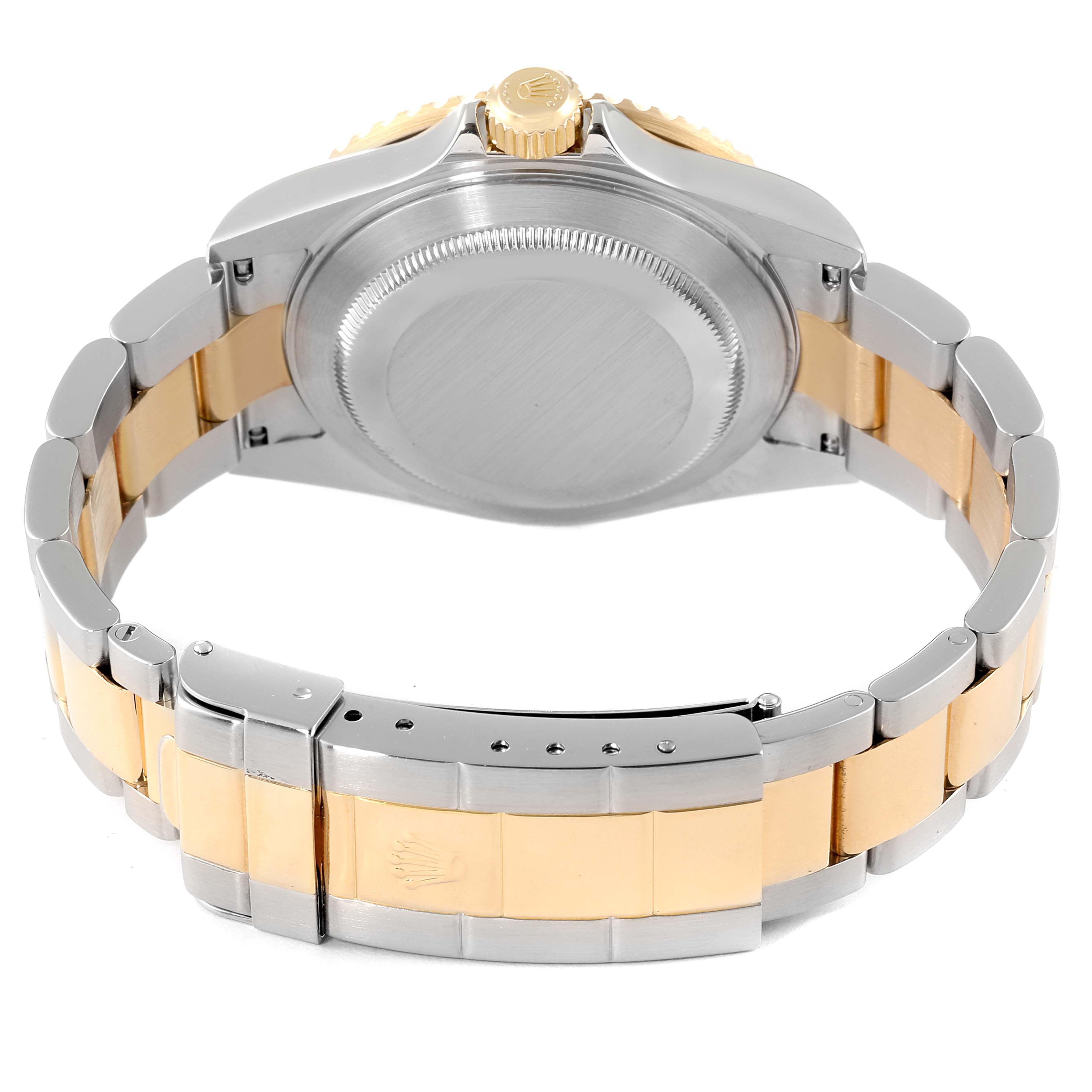 This image shows the back case, crown, and two-tone bracelet of a Rolex Submariner 16613 Men
s Steel and Gold (two tone) Blue Dial 16613 Men
s Steel and Gold (two tone) Blue Dial watch from a rear angle.