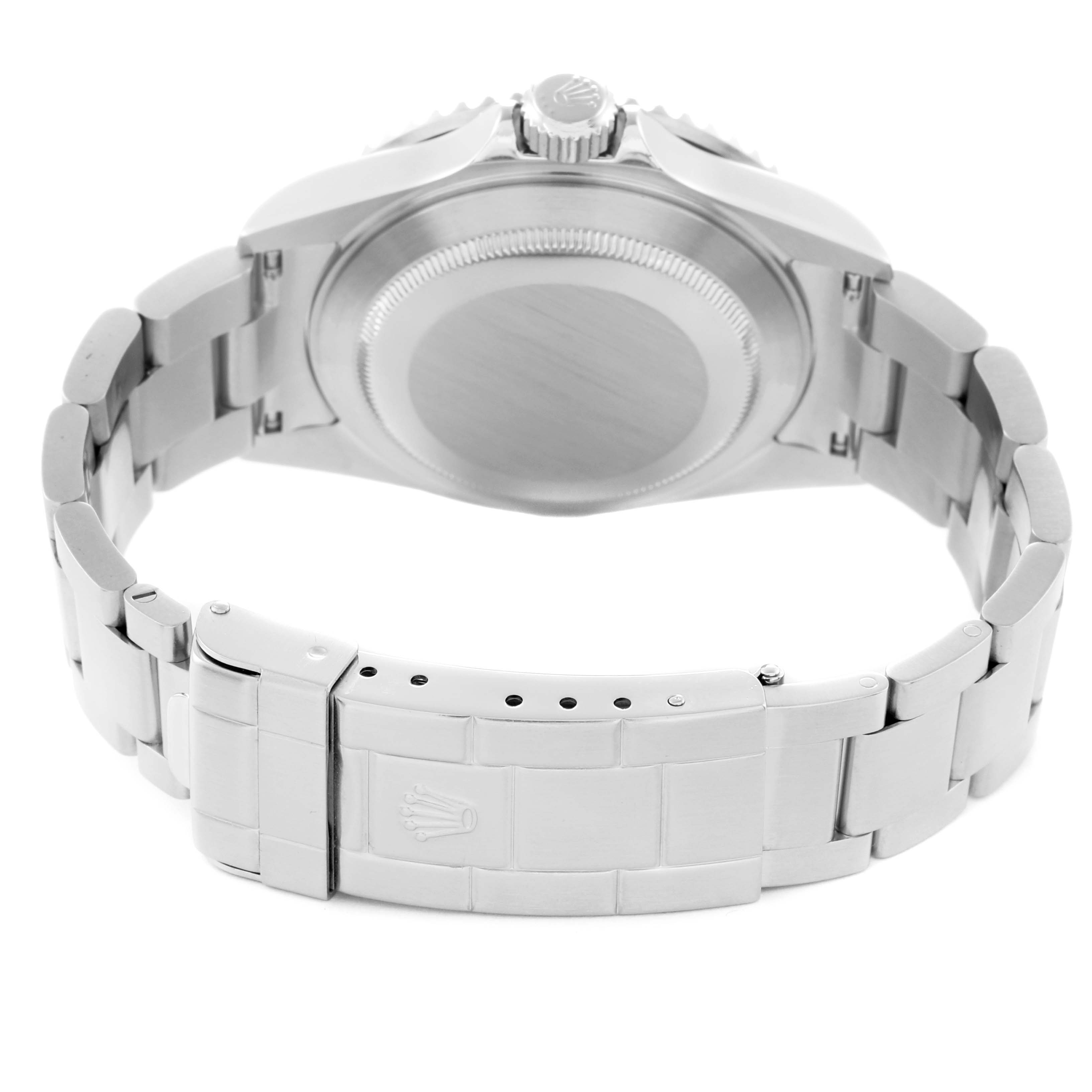 The Rolex Submariner 16610 Men
s Stainless Steel Black Dial 16610 Men
s Stainless Steel Black Dial watch is shown from the back, displaying its case back, bracelet, and clasp.