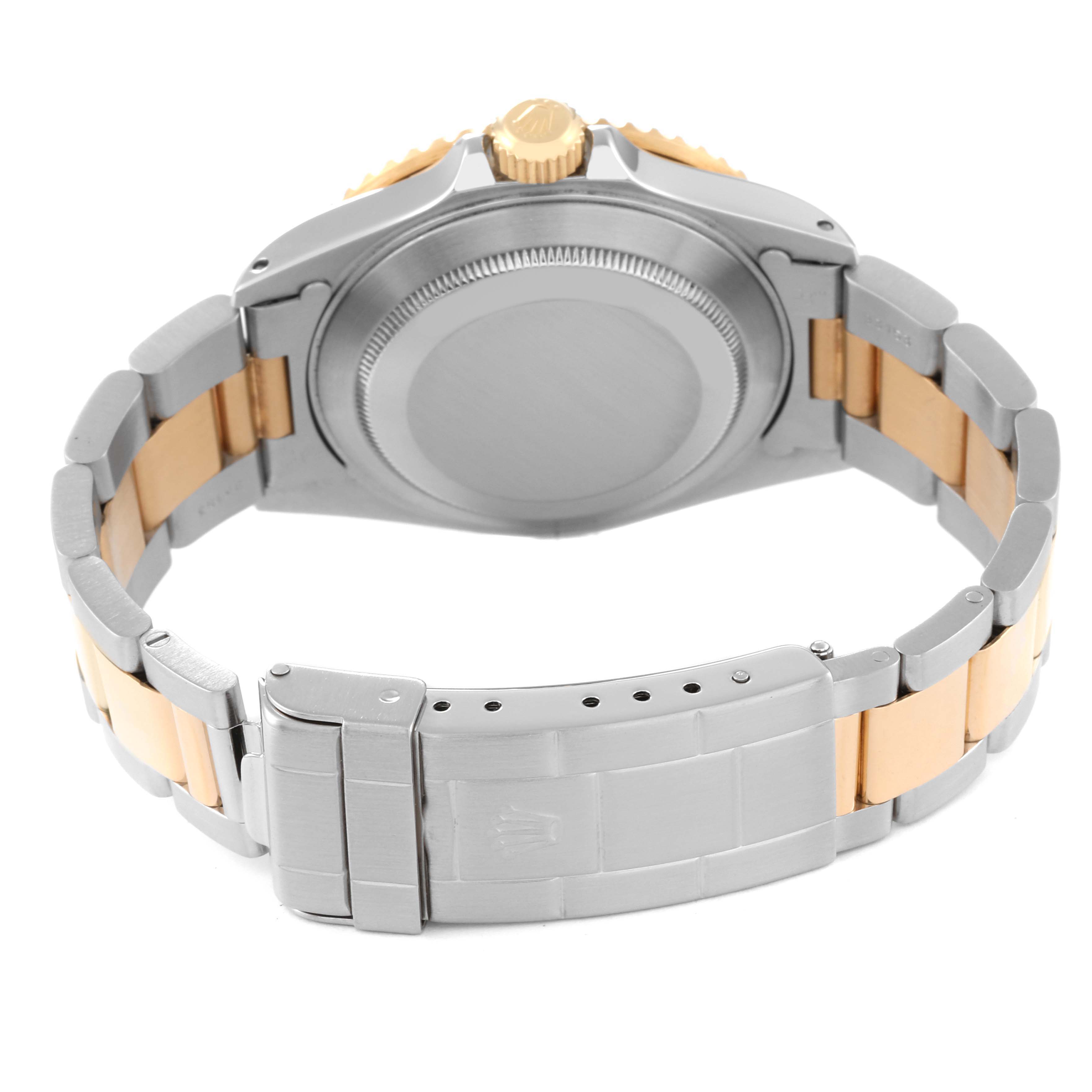 This image shows the back case and bracelet clasp of a Rolex Submariner 16613 Men's Steel and Gold (two tone) Champagne Dial 16613 Men's Steel and Gold (two tone) Champagne Dial watch, viewed from the rear angle.