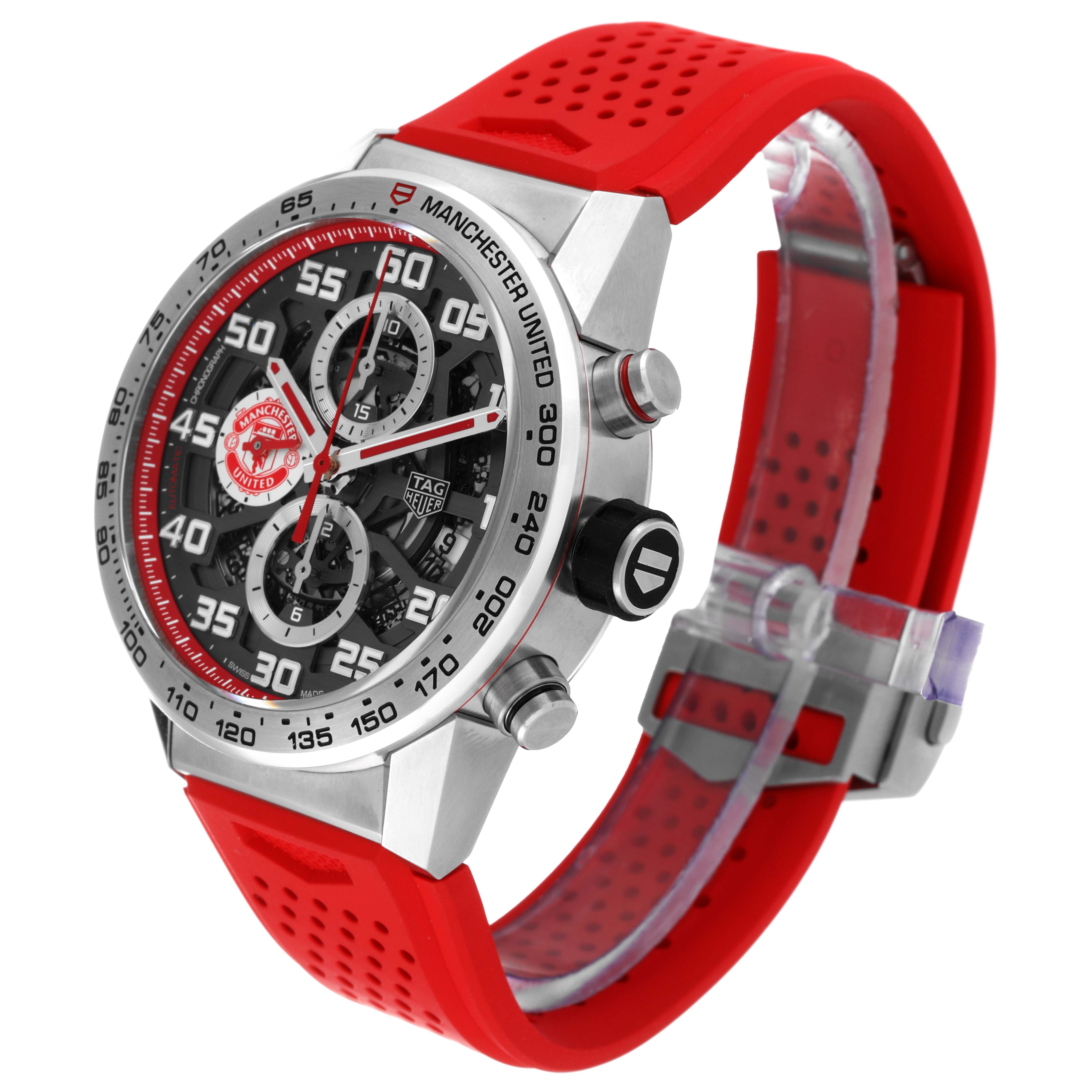 The image shows a Tag Heuer Manchester United Limited Edition watch at a slight side angle, highlighting the face, bezel, and red strap.