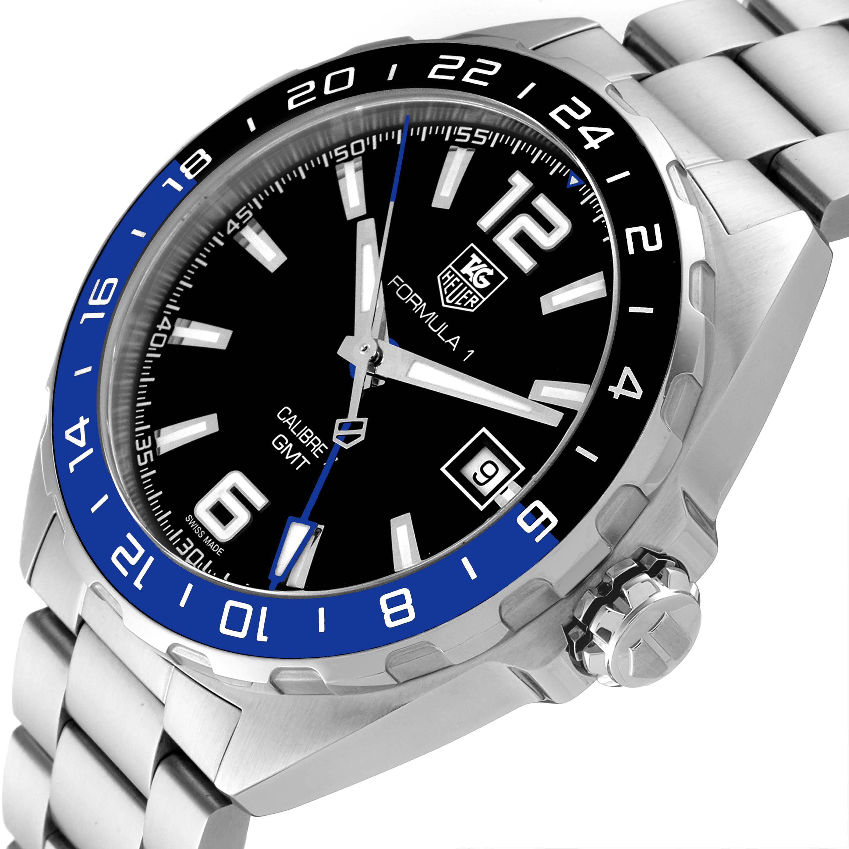 The image shows a close-up angle of the Tag Heuer Formula 1 WAZ211A.BA0875 Men's Stainless Steel Black Dial WAZ211A.BA0875 Men's Stainless Steel Black Dial watch, displaying its face, crown, and part of the metal bracelet.