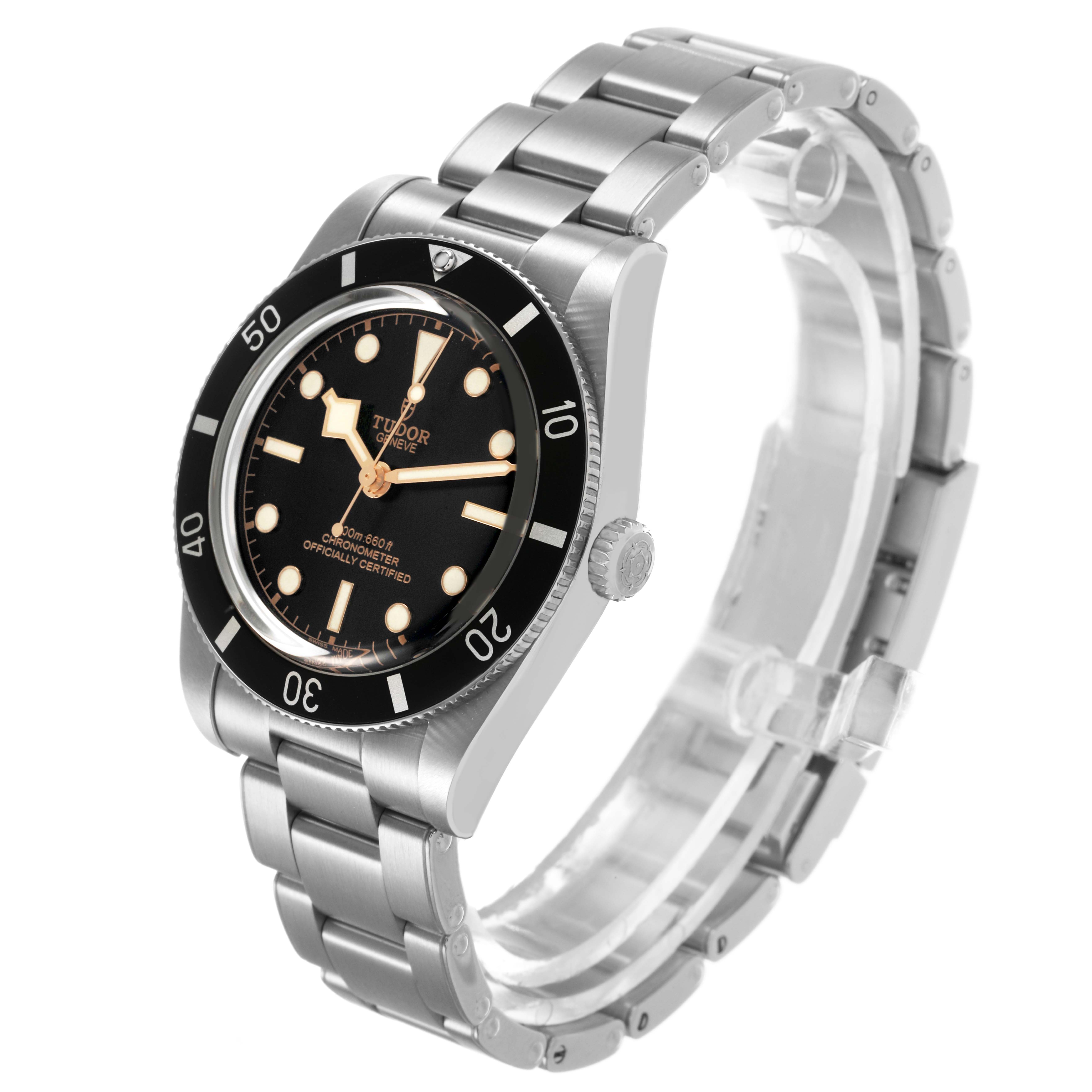 The Tudor Heritage Black Bay M79000N Men's Stainless Steel Black Dial watch is shown at an angled side view, displaying the bezel, dial, crown, and bracelet.