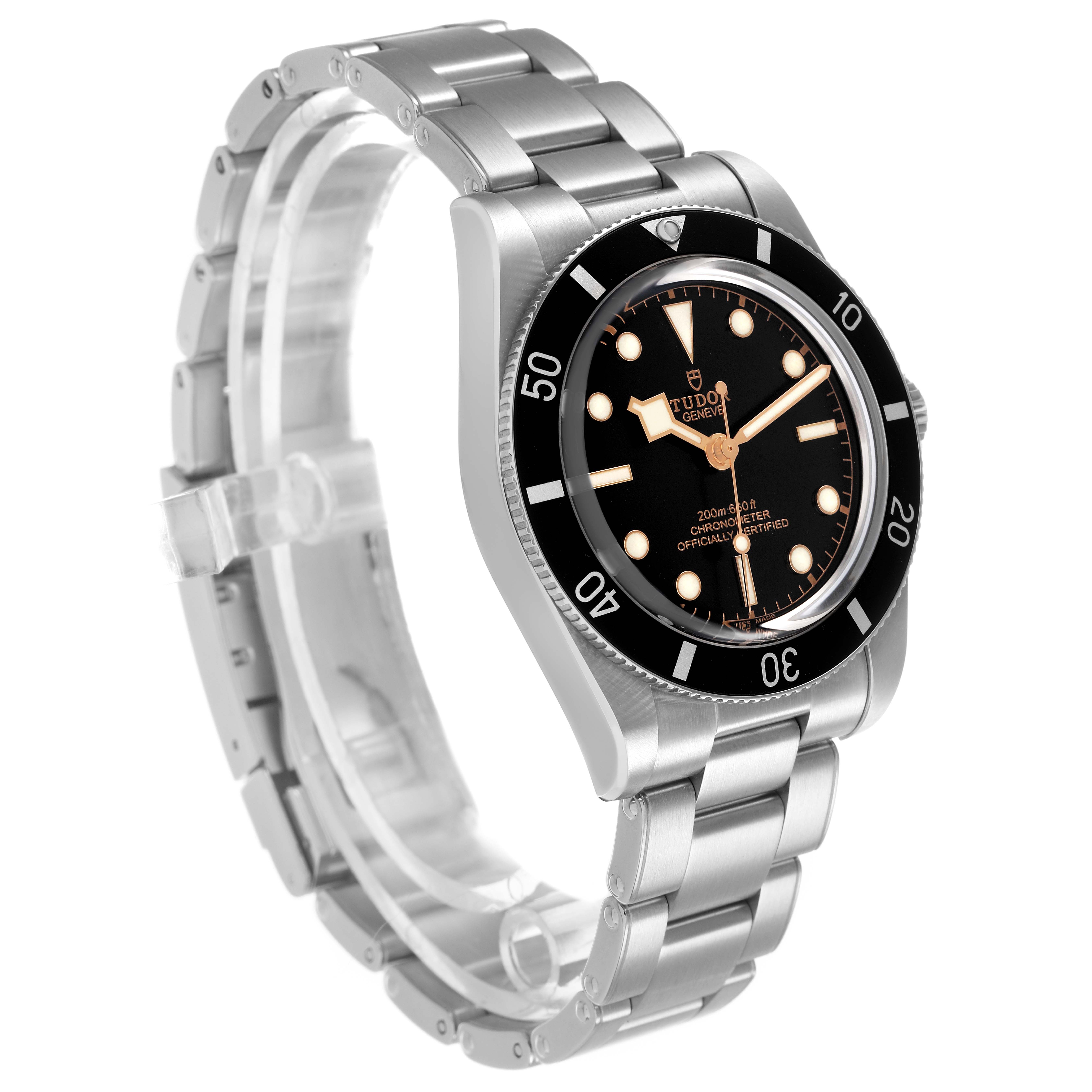 The Tudor Heritage Black Bay M79000N Men's Stainless Steel Black Dial watch is shown at an angle highlighting the bezel, dial, case, and bracelet.