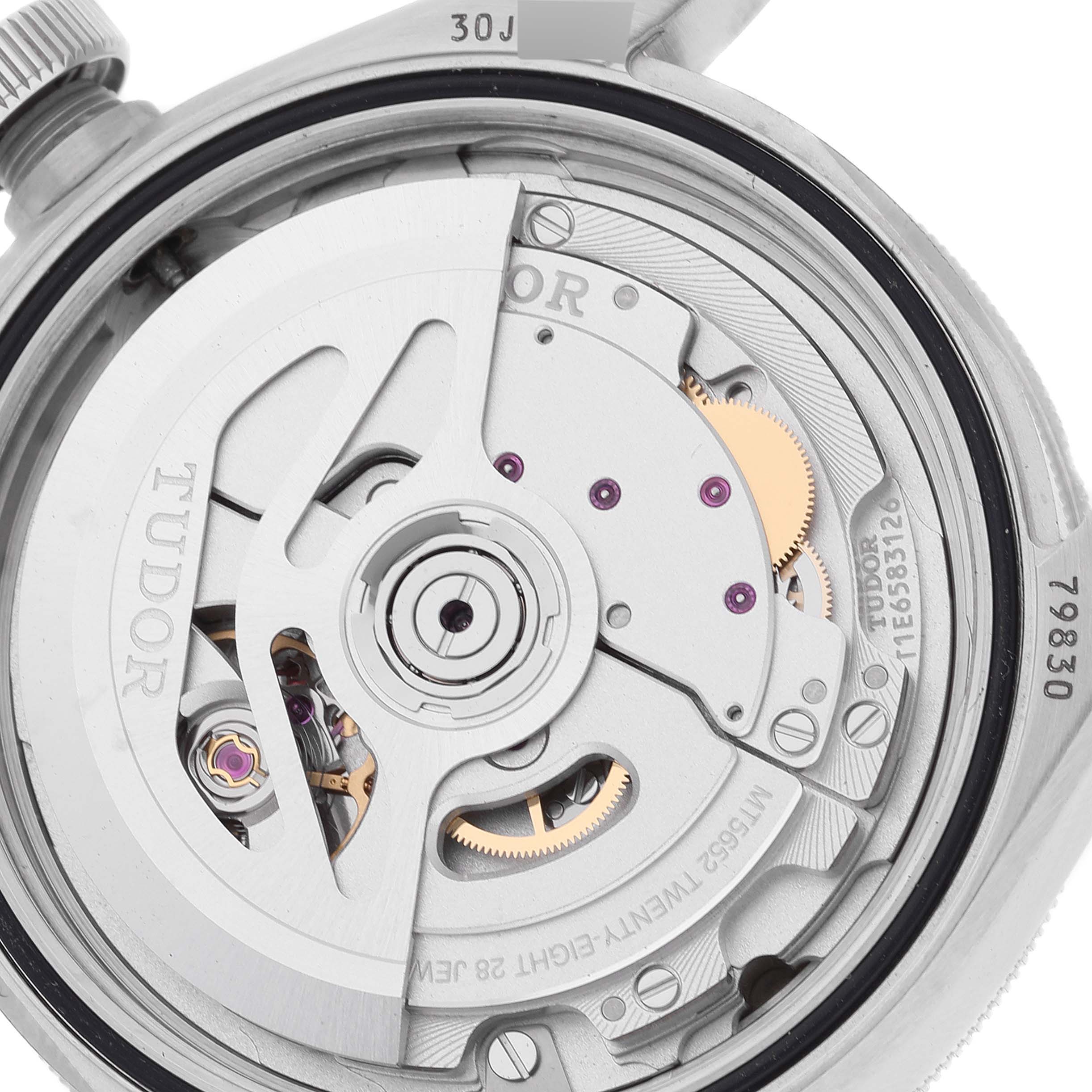 The image shows an up-close view of the movement mechanism inside a Tudor Heritage Black Bay 79830RB Men
s Stainless Steel Black Dial 79830RB Men
s Stainless Steel Black Dial watch.