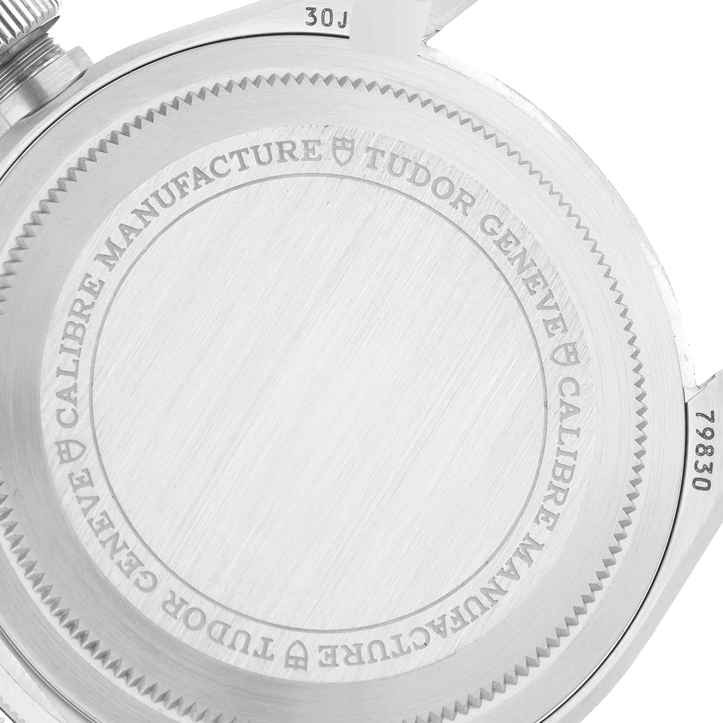 The image shows the back case of a Tudor Heritage Black Bay 79830RB Men
s Stainless Steel Black Dial 79830RB Men
s Stainless Steel Black Dial watch, highlighting the branding and model number.