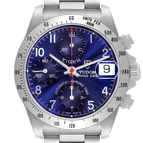 The Tudor Tiger 79280 Men's Stainless Steel Blue Dial watch is shown from a front angle, highlighting the blue dial, chronograph subdials, date window, and bezel details.