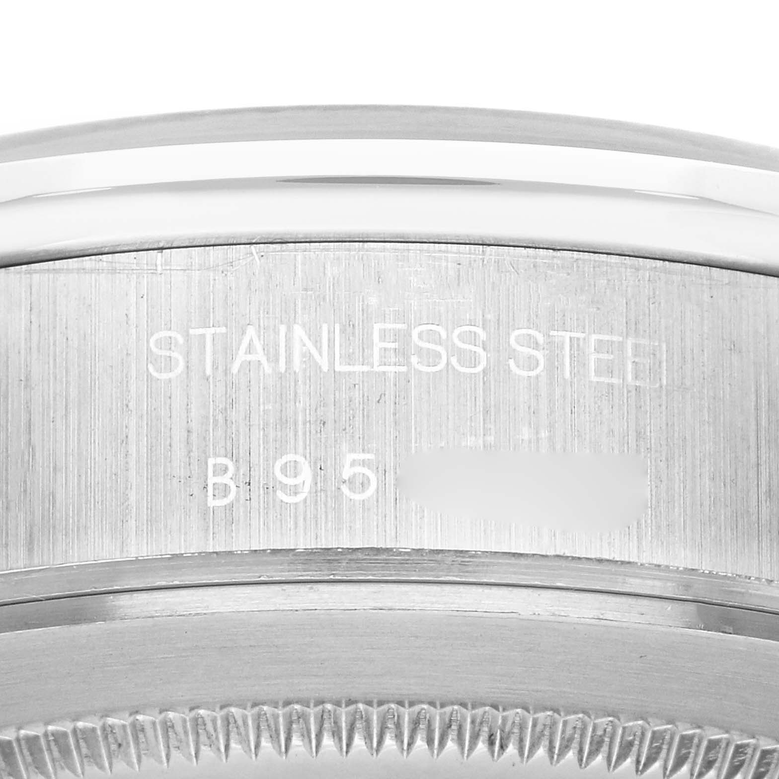 The image shows a close-up of the stainless steel back of a Tudor Tiger 79280 Men
s Stainless Steel Blue Dial 79280 Men
s Stainless Steel Blue Dial watch, highlighting the engraving details.