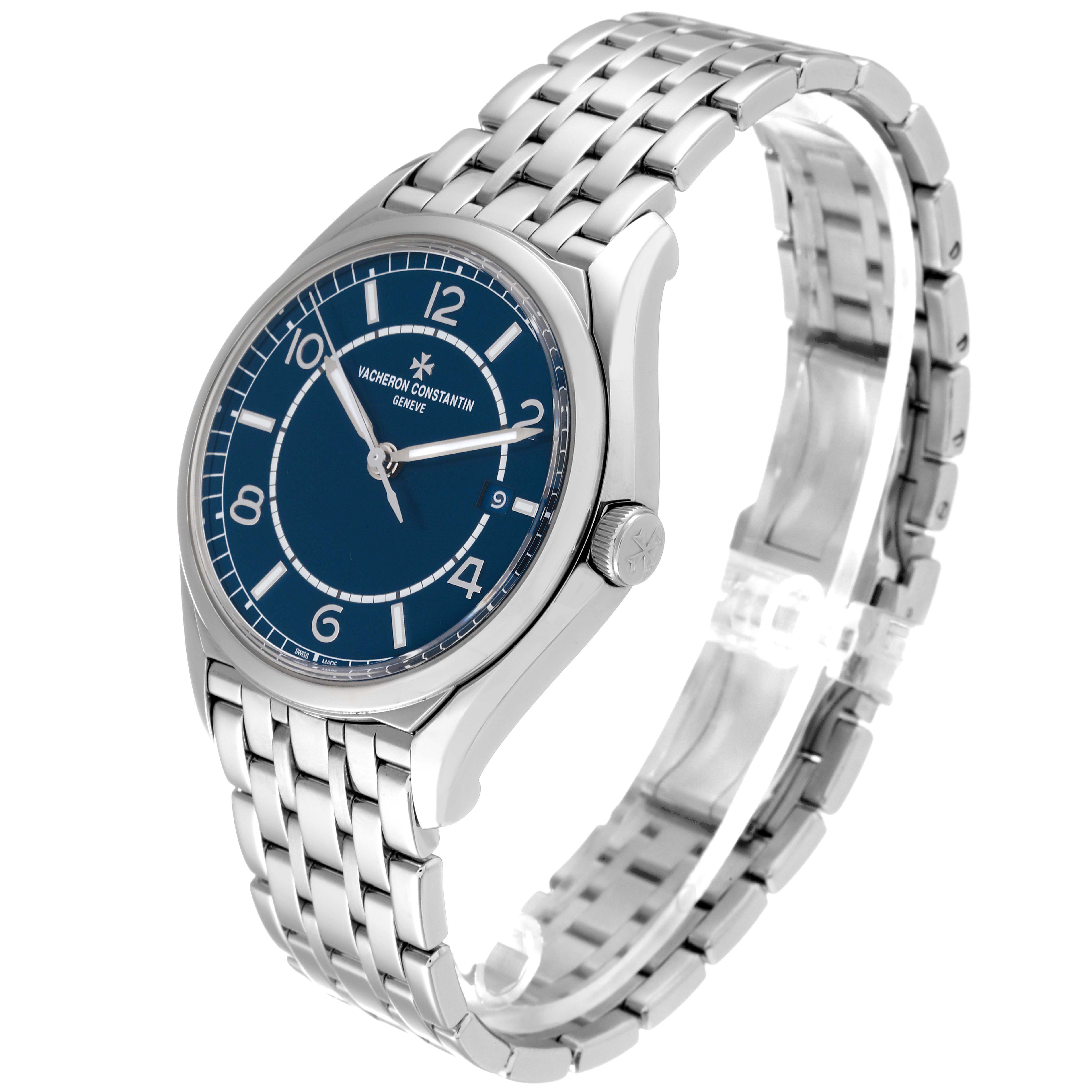 The Vacheron Constantin Fiftysix 4600E/110A-B487 Men
s Stainless Steel Blue Dial 4600E/110A-B487 Men
s Stainless Steel Blue Dial watch is shown at a three-quarter angle, highlighting its blue dial, crown, and metal bracelet.