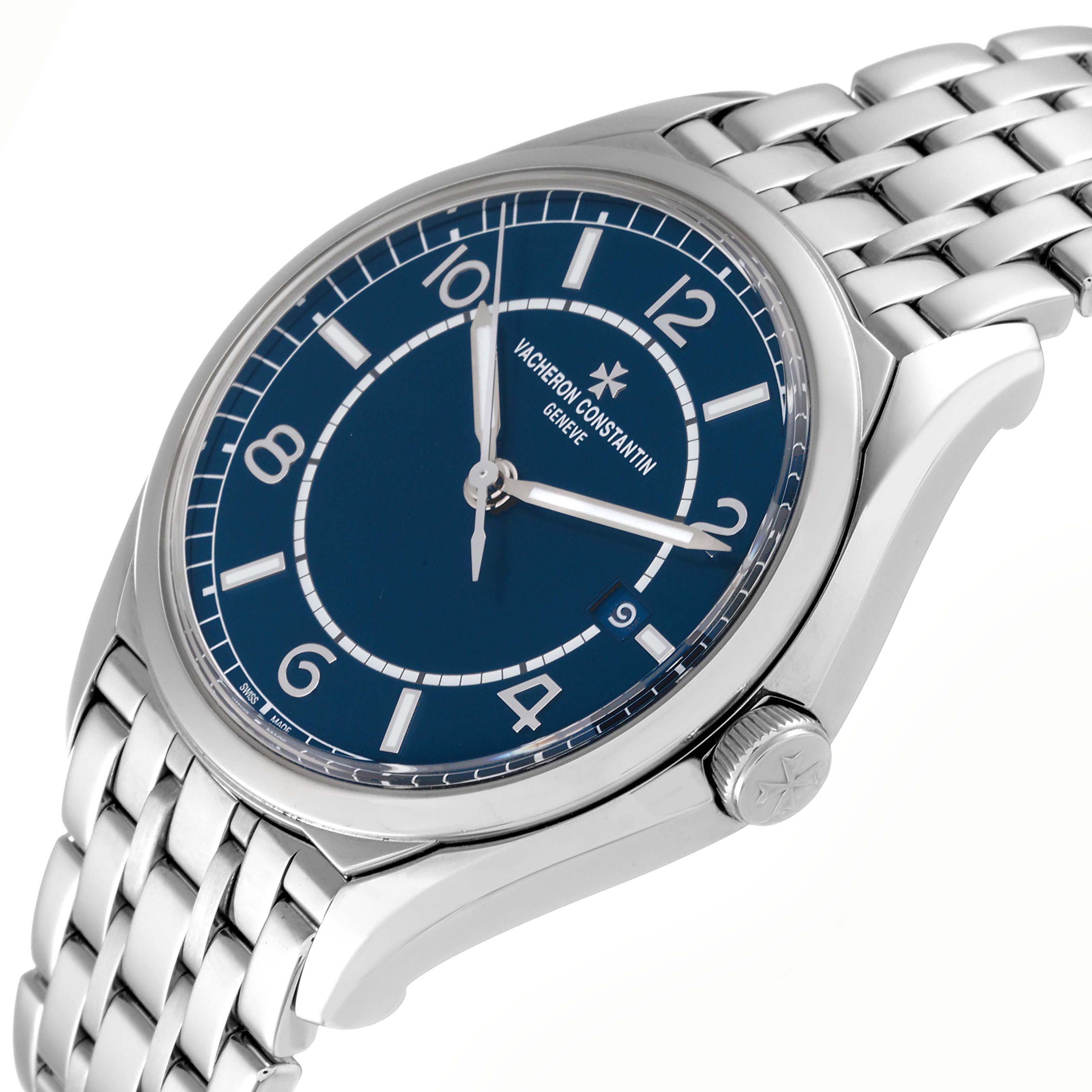 The Vacheron Constantin Fiftysix 4600E/110A-B487 Men
s Stainless Steel Blue Dial 4600E/110A-B487 Men
s Stainless Steel Blue Dial watch is shown at a side angle displaying the face, crown, and part of the bracelet.