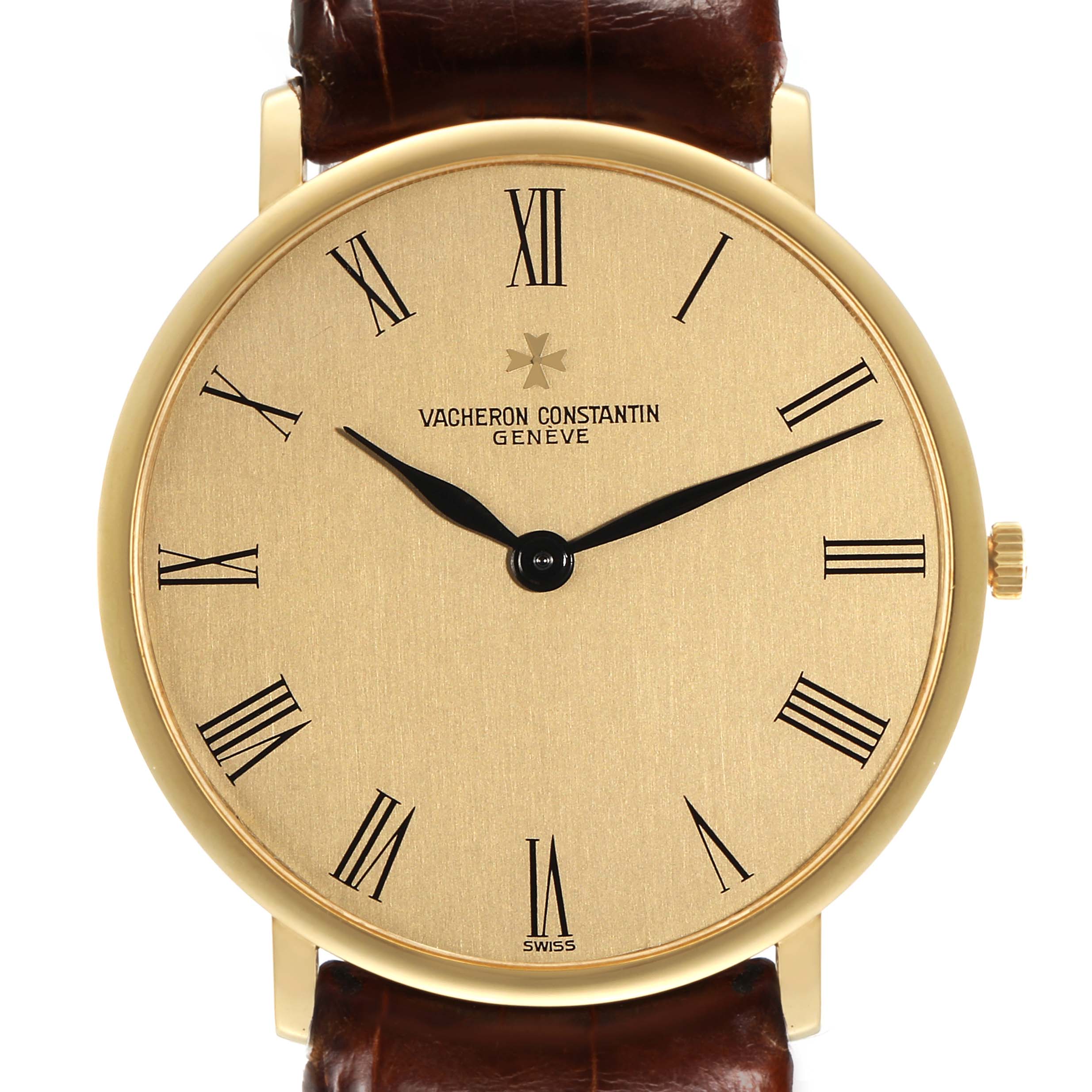 The Vacheron Constantin Patrimony 33216 Men
s Yellow Gold Champagne Dial 33216 Men
s Yellow Gold Champagne Dial watch is shown from a front angle, displaying its gold dial, Roman numerals, and brown leather strap.
