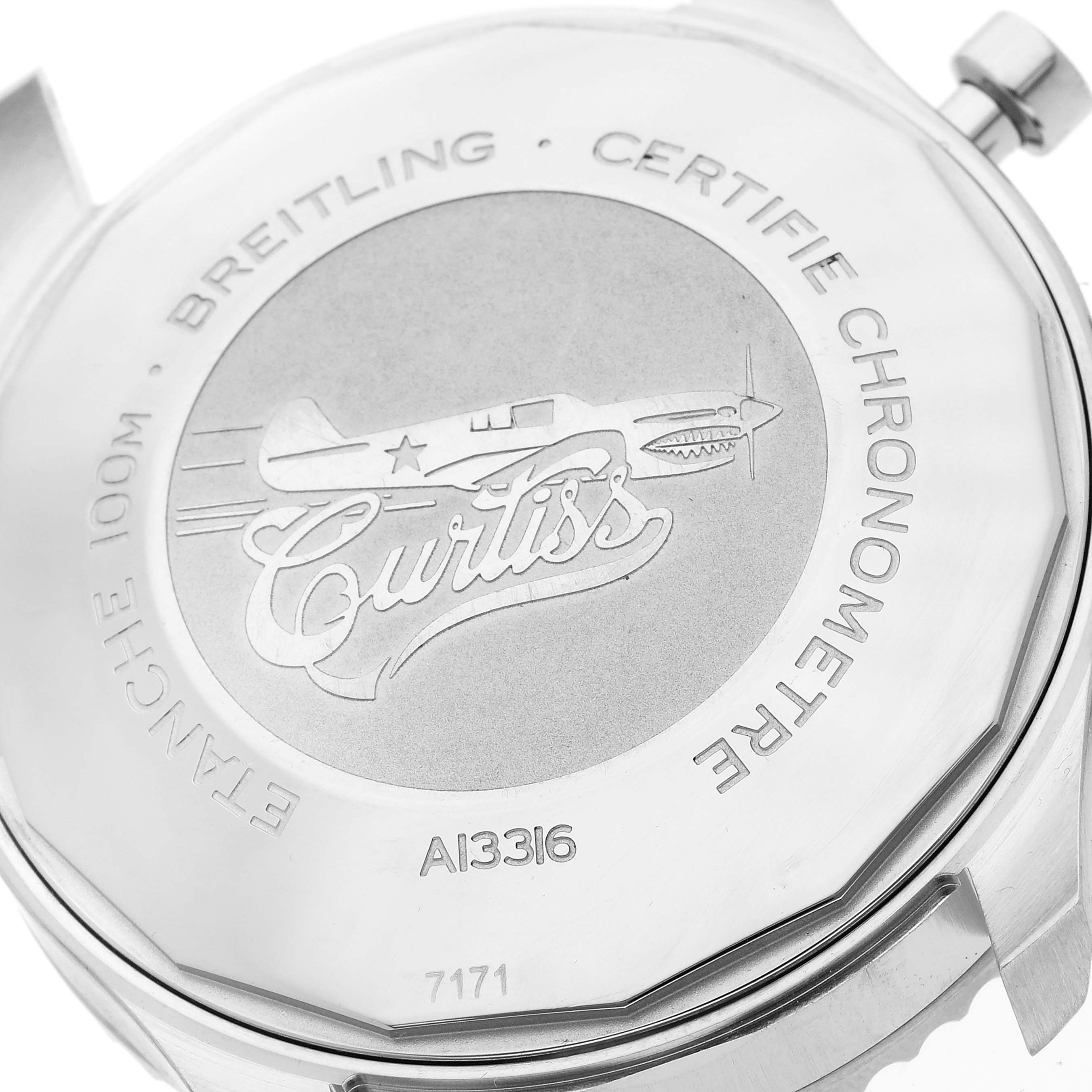 This image shows the back case of a Breitling Aviator A13316 Men's Stainless Steel Green Dial A13316 Men's Stainless Steel Green Dial watch, highlighting its engraved design and certification details.