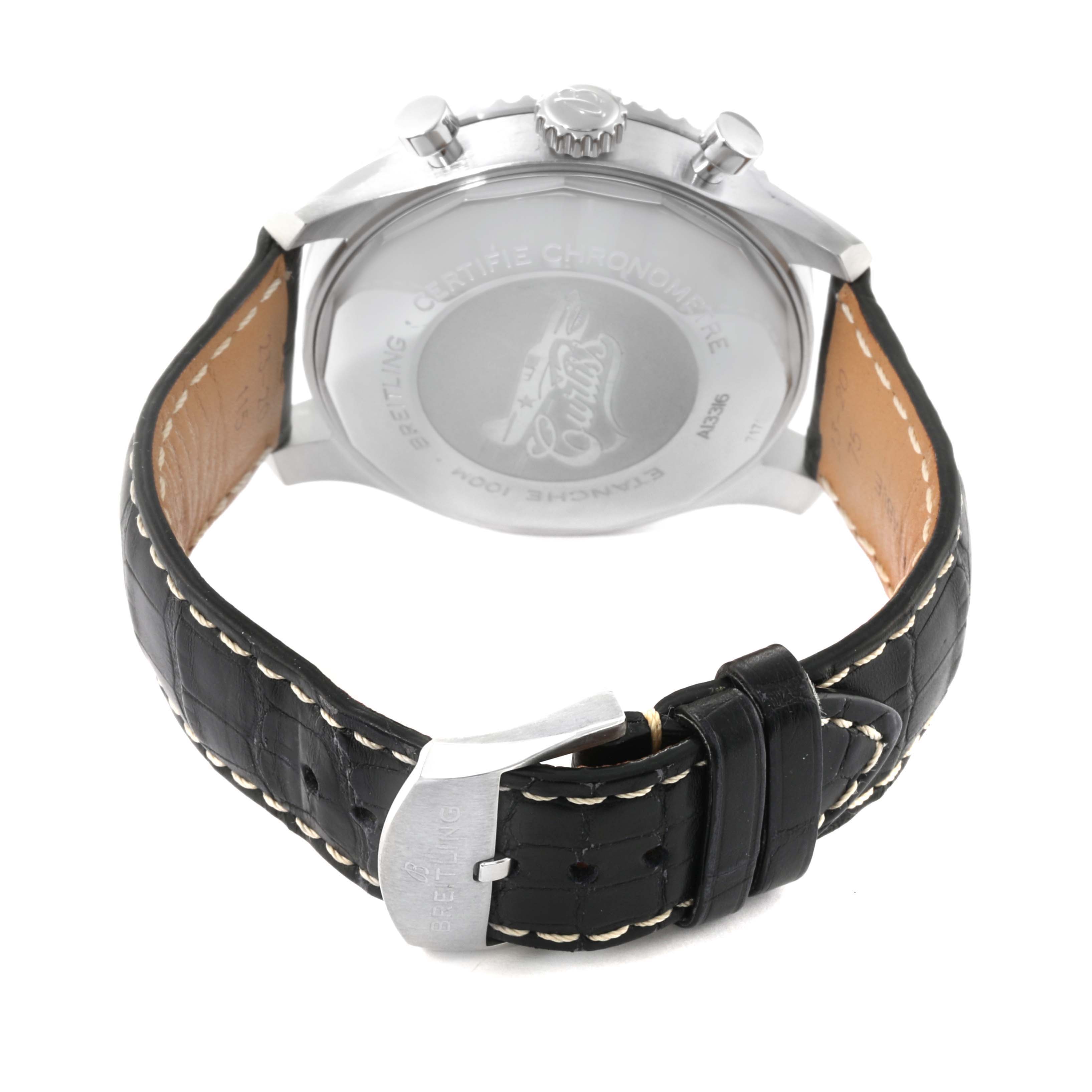 The image shows the back of the Breitling Aviator A13316 Men's Stainless Steel Green Dial A13316 Men's Stainless Steel Green Dial watch, highlighting the case back and black leather strap with a buckle.