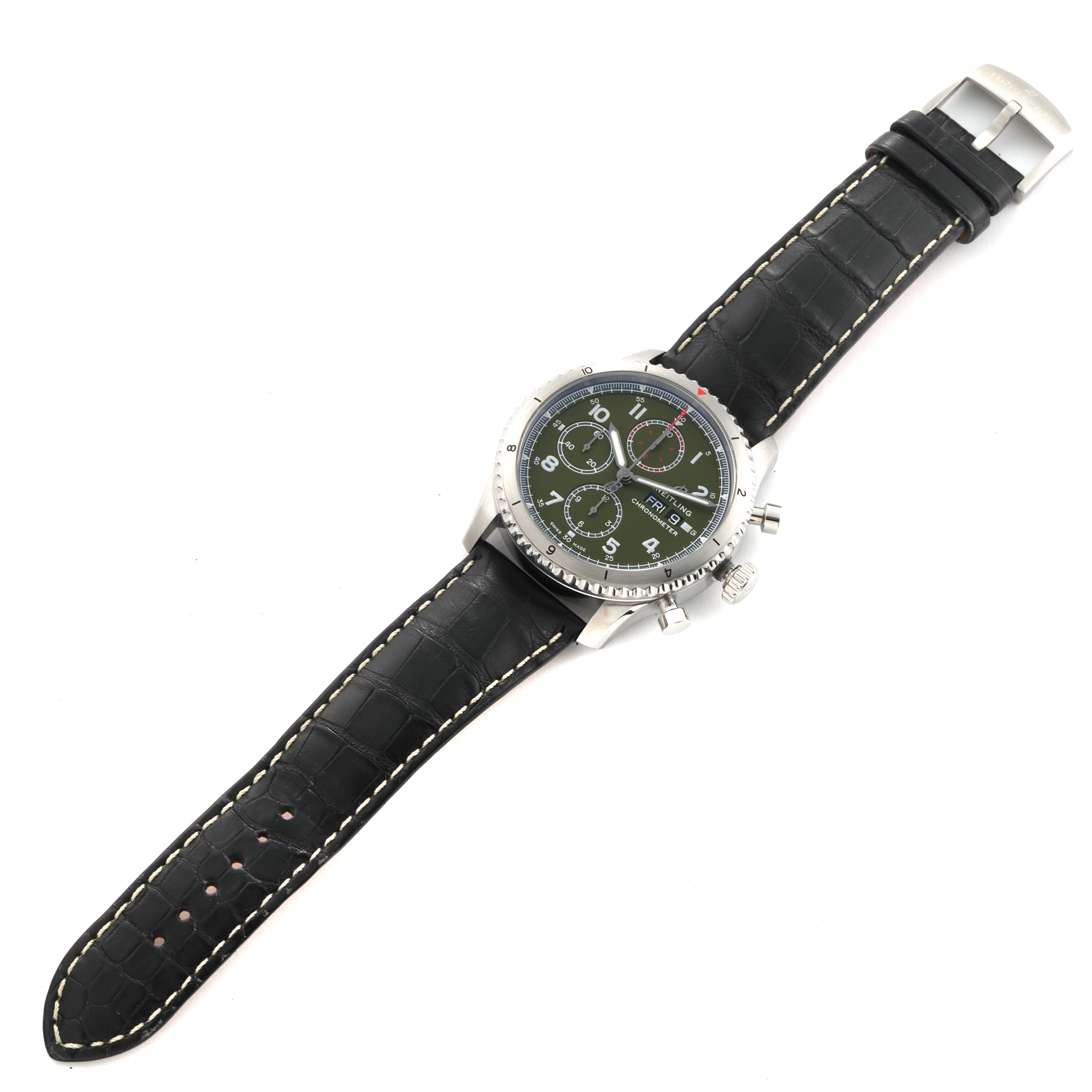 The image shows a top view of a Breitling Aviator A13316 Men's Stainless Steel Green Dial A13316 Men's Stainless Steel Green Dial watch with a green dial and a black leather strap.