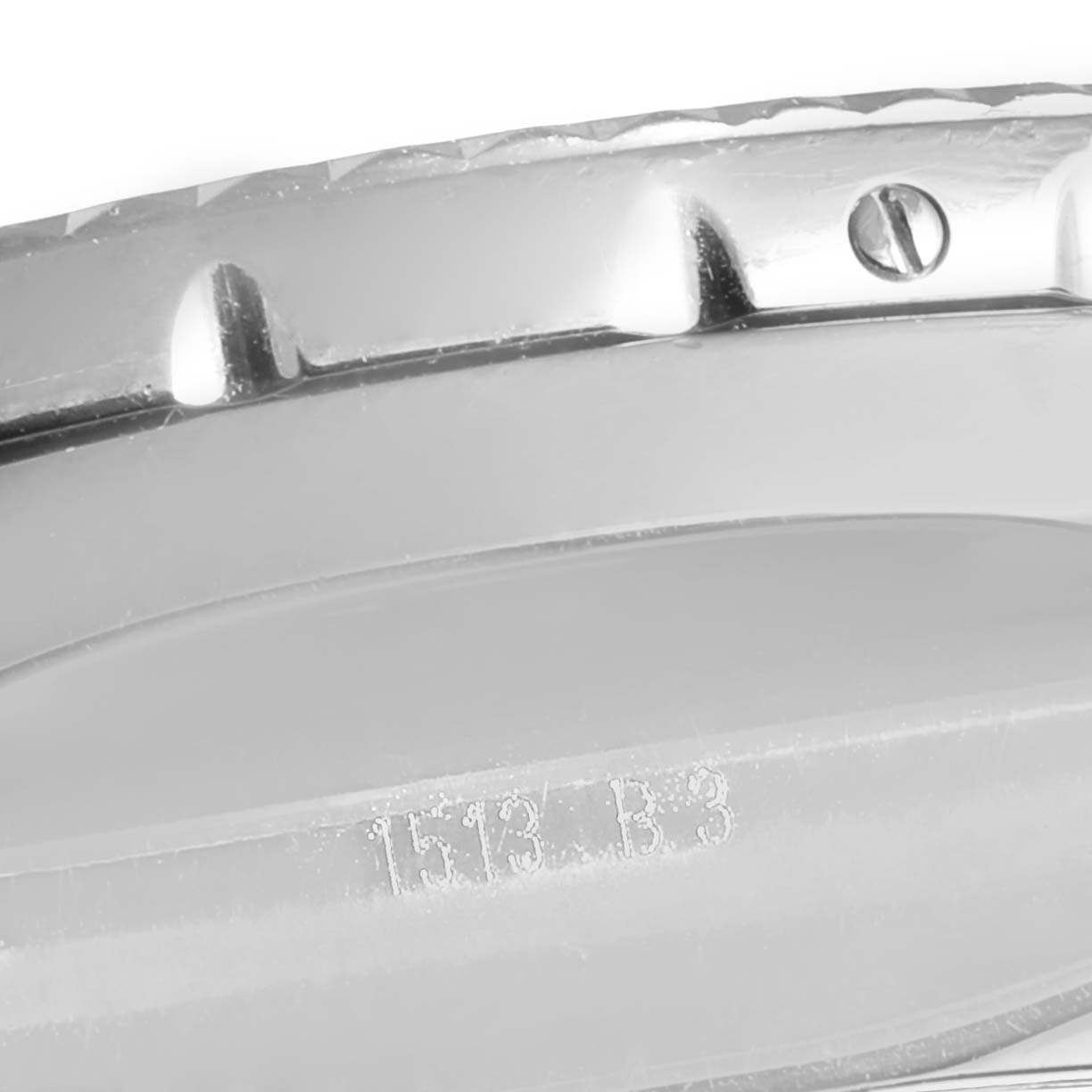 The image shows a close-up view of the side, bezel, and a part with the serial number of a Breitling Bentley AB0431  Men
s Stainless Steel Silver Dial AB0431  Men
s Stainless Steel Silver Dial watch.