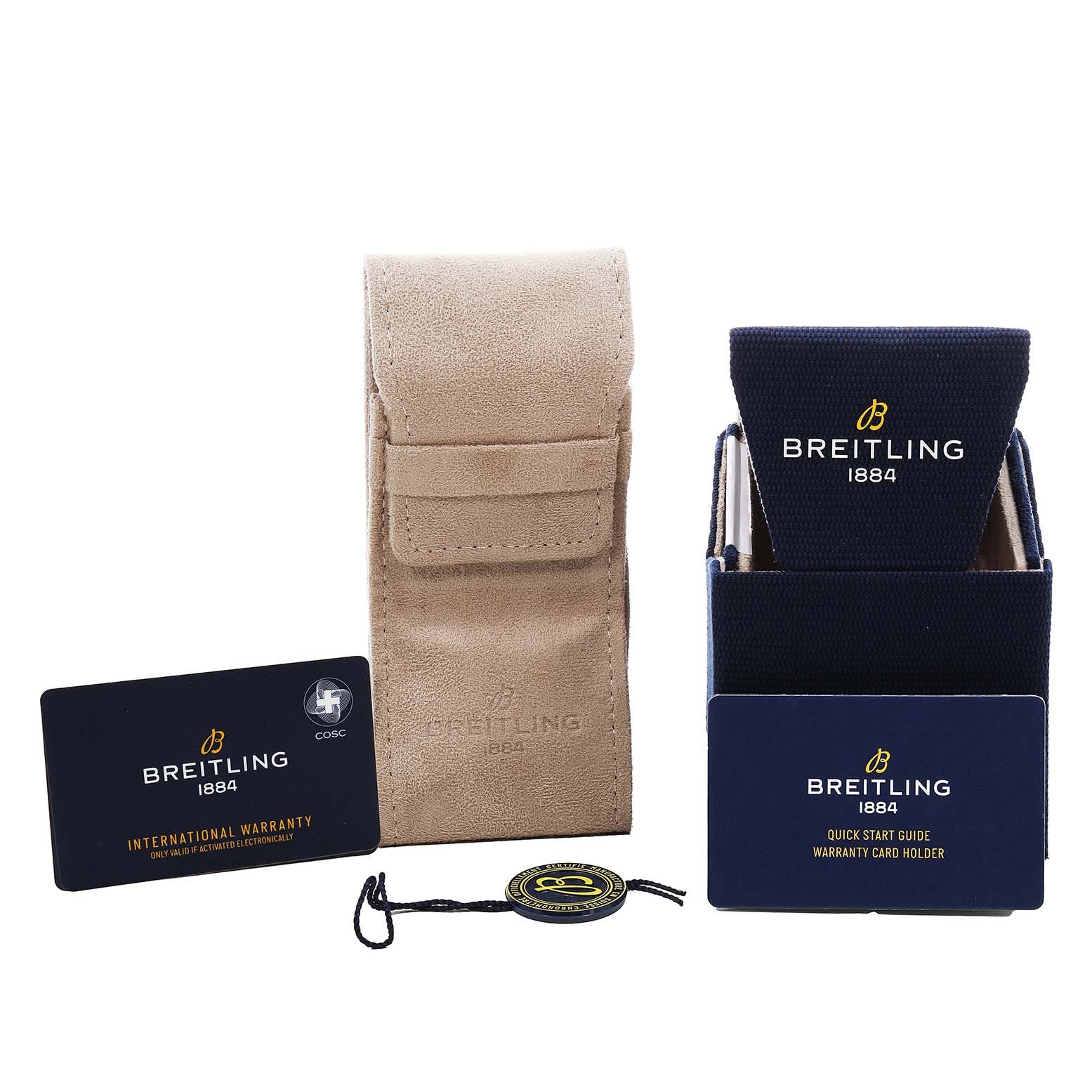 The image shows accessories for the Breitling Navitimer AB0138 Men's Stainless Steel Blue Dial: a suede pouch, warranty card, tag, and box.