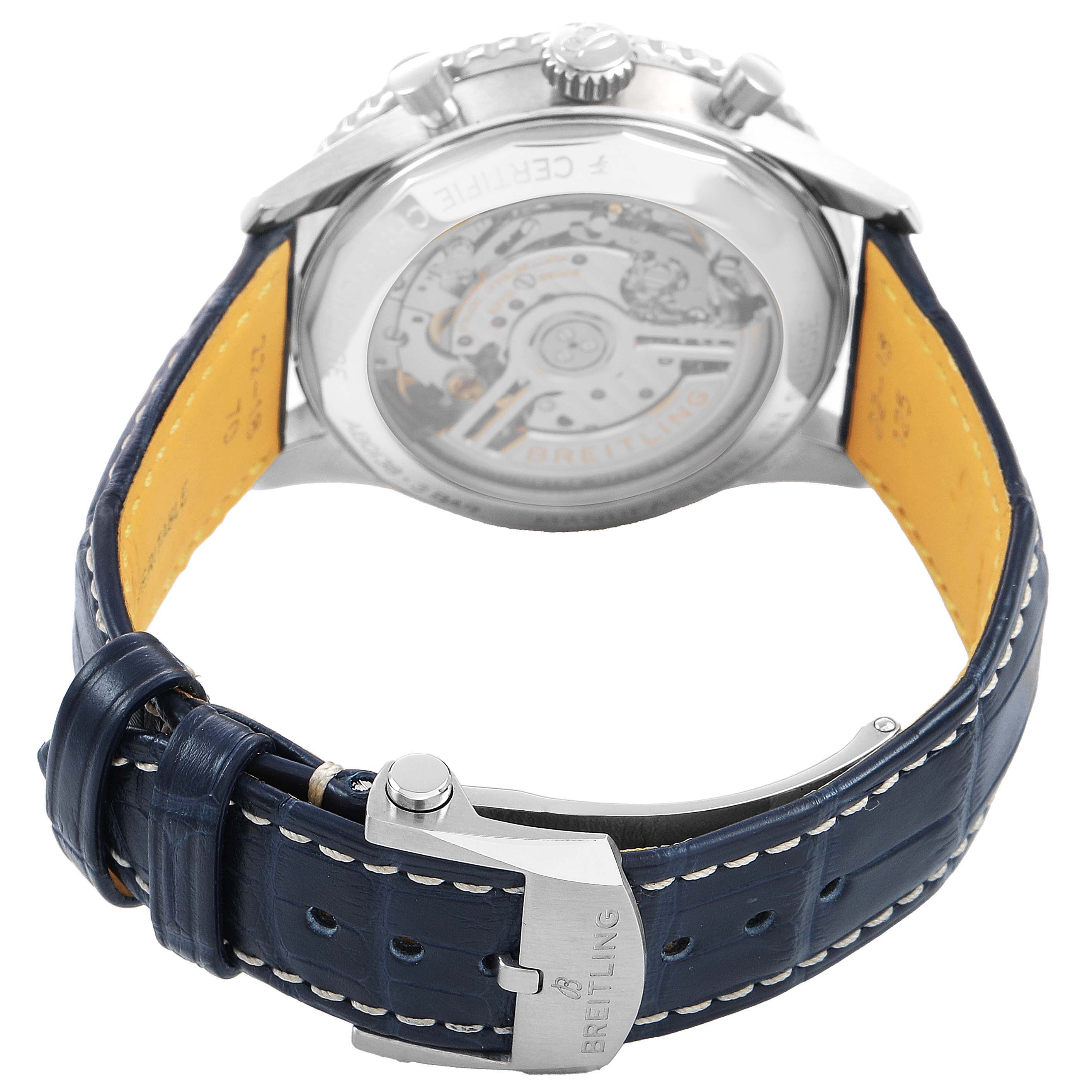 The Breitling Navitimer AB0138 Men's Stainless Steel Blue Dial watch is shown from the back, highlighting its transparent case back and blue leather strap.