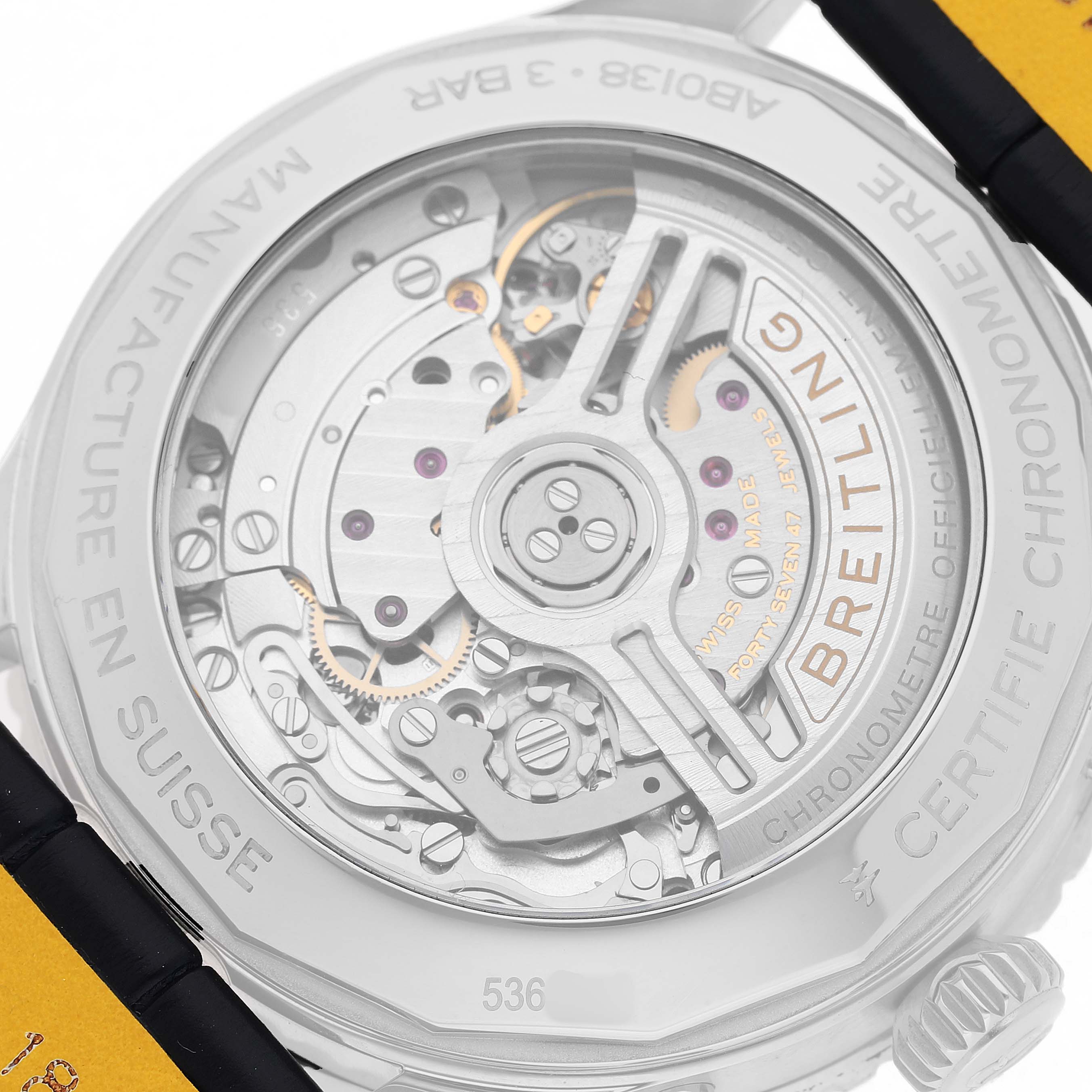 The image shows the case back of the Breitling Navitimer AB0138 Men's Stainless Steel Blue Dial, displaying its intricate movement components.