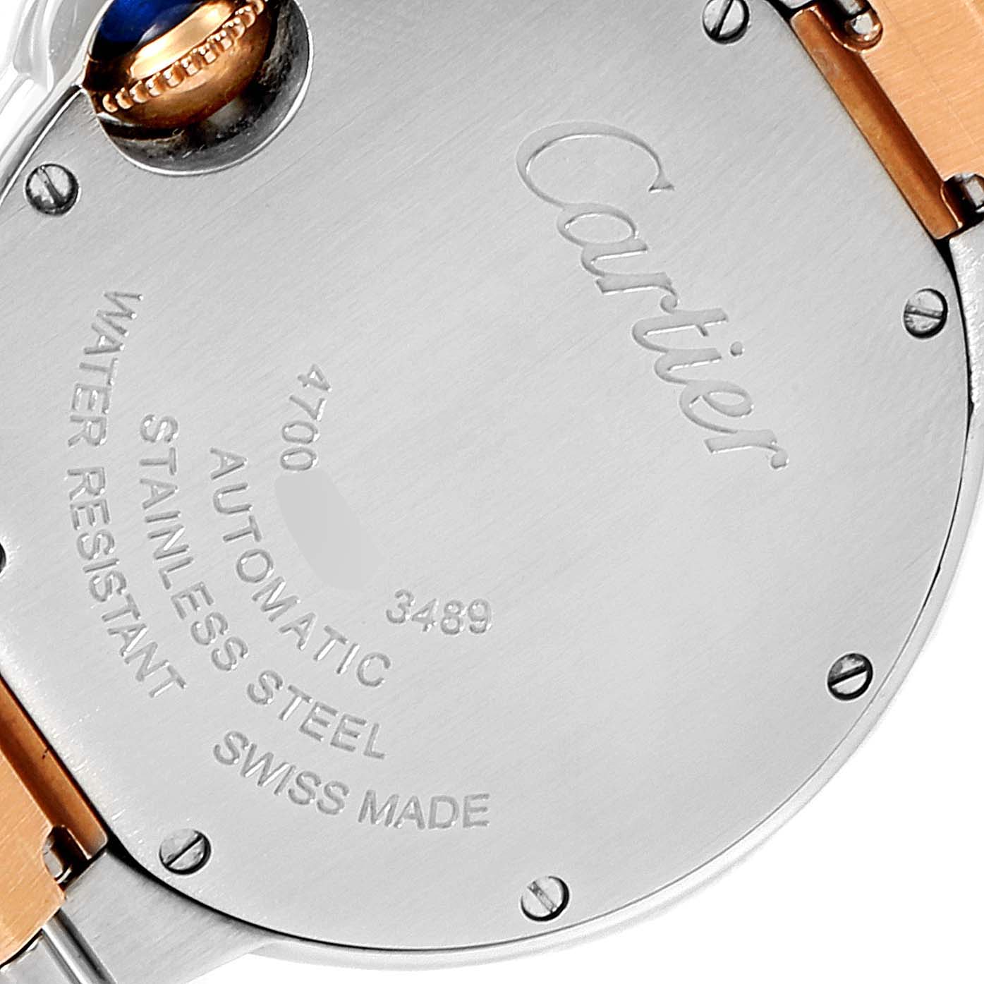 The image shows the back case of a Cartier Ballon Bleu W6920098 Women's Steel and Gold (two tone) Mother of Pearl Dial W6920098 Women's Steel and Gold (two tone) Mother of Pearl Dial watch, displaying its specifications and part of the crown.