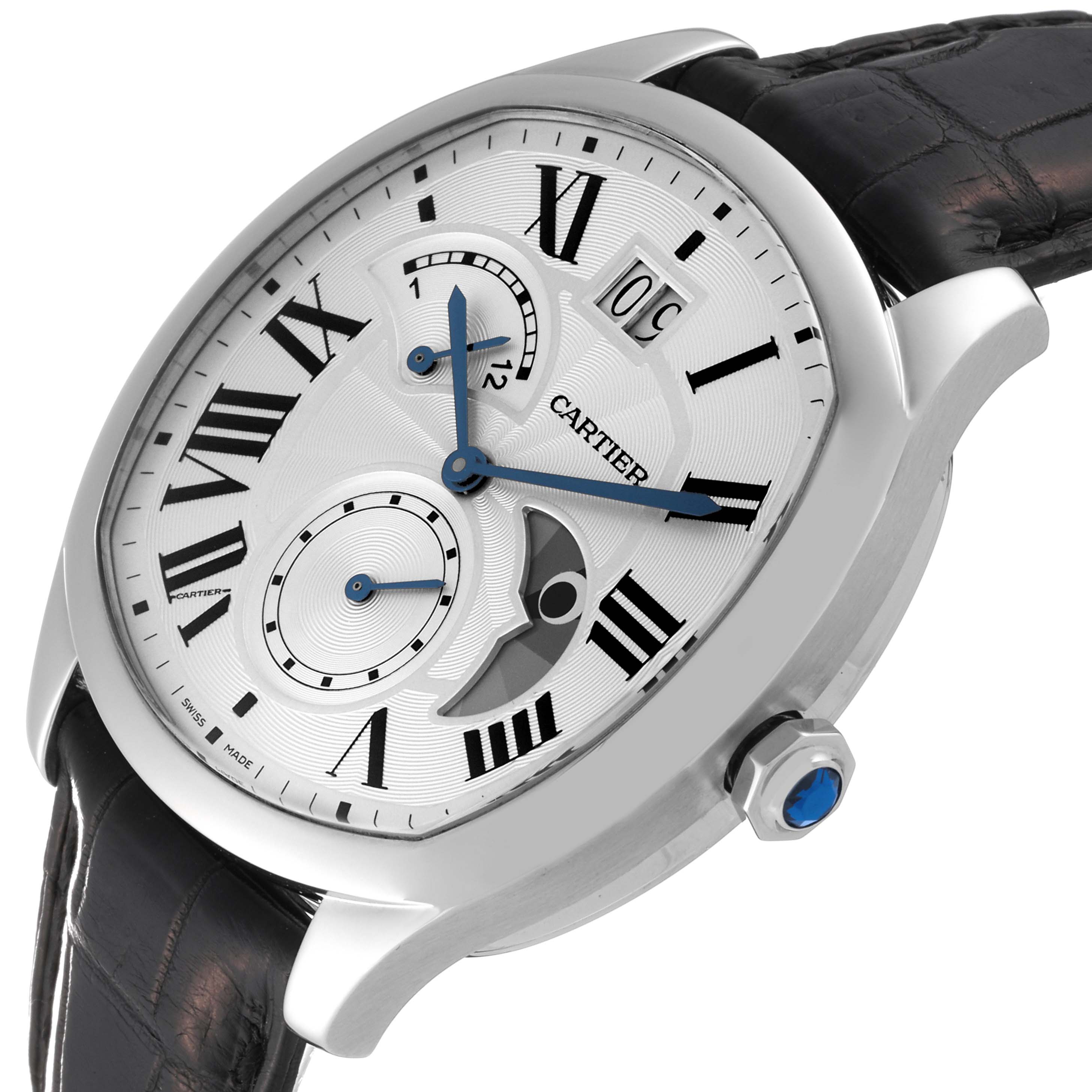 The image shows a Drive de Cartier watch by Cartier at an oblique angle, highlighting its face, Roman numerals, subdials, and crown.