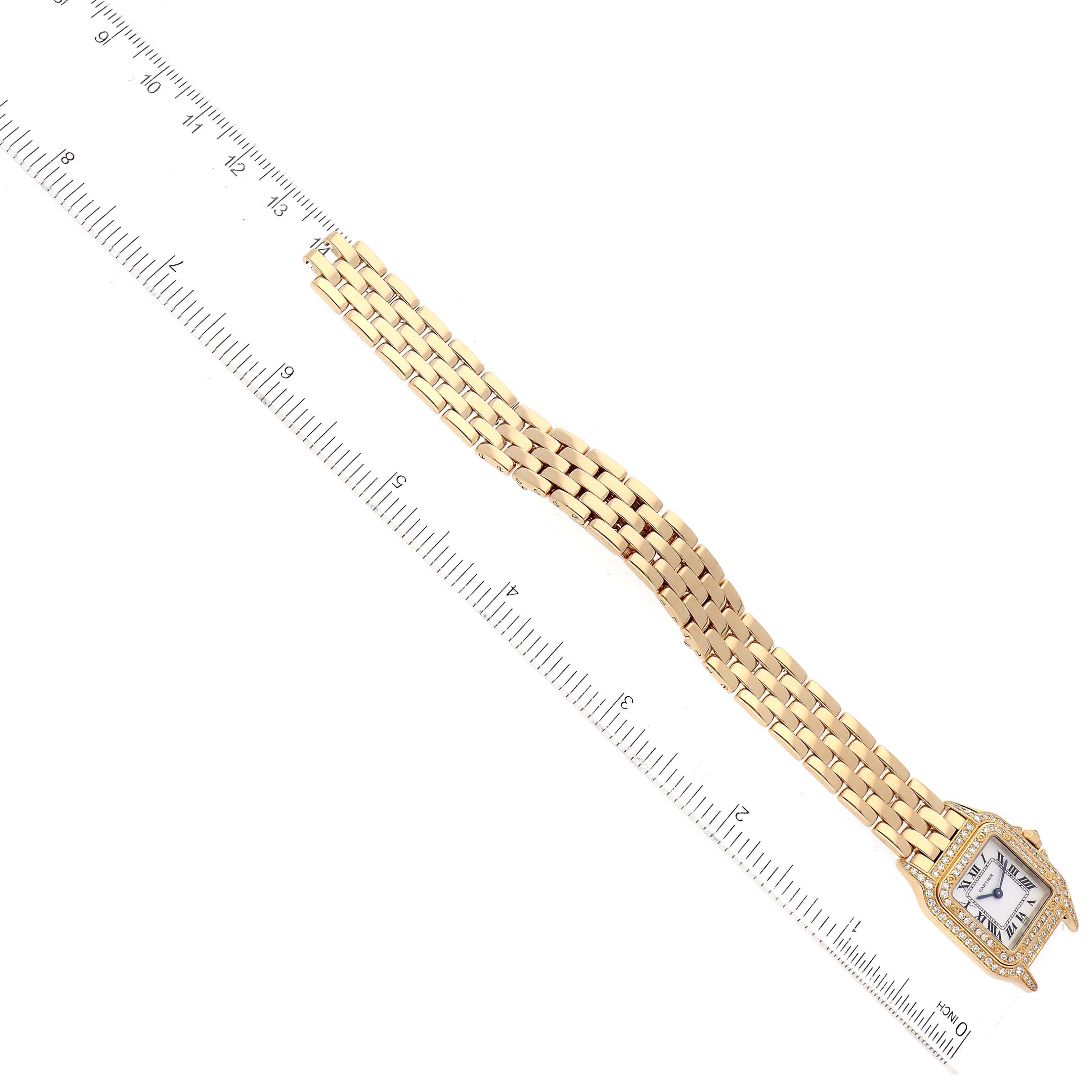 The image shows a Panthere de Cartier watch lying flat with a close-up view of the bracelet and face.