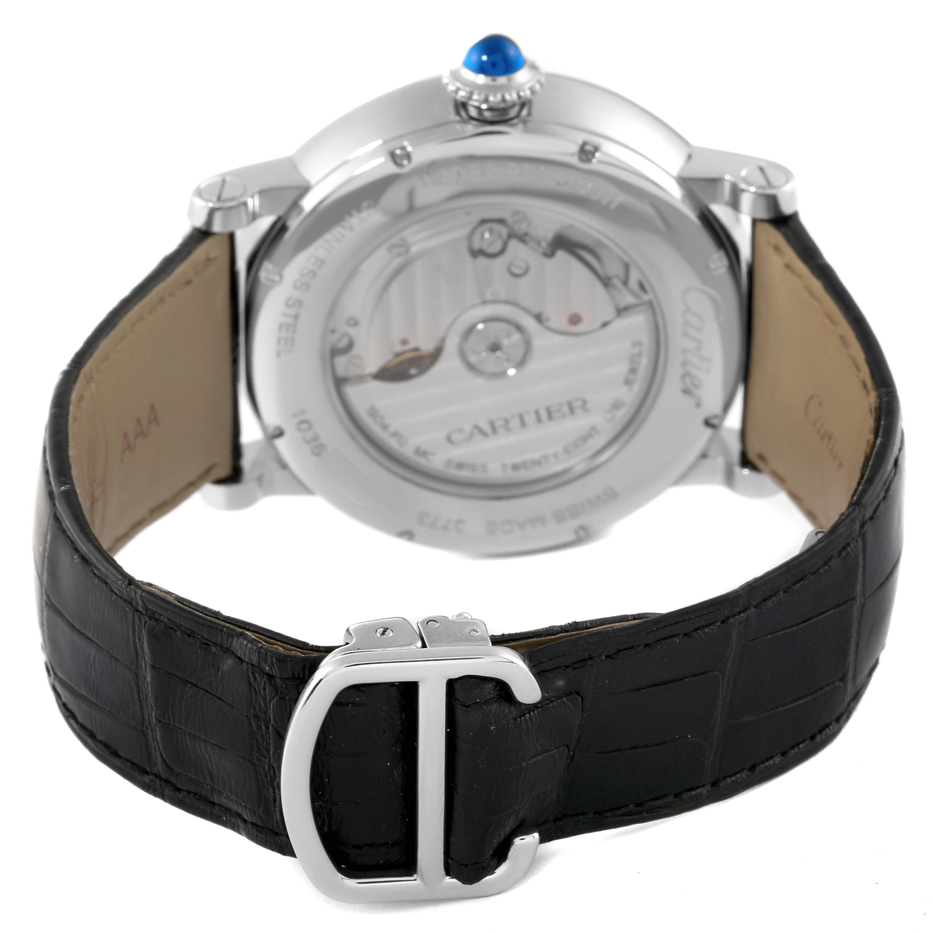 This image shows the back view of a Cartier Rotonde W1556368 Men
s Stainless Steel Silver Dial W1556368 Men
s Stainless Steel Silver Dial watch, highlighting its automatic movement and leather strap with a clasp.