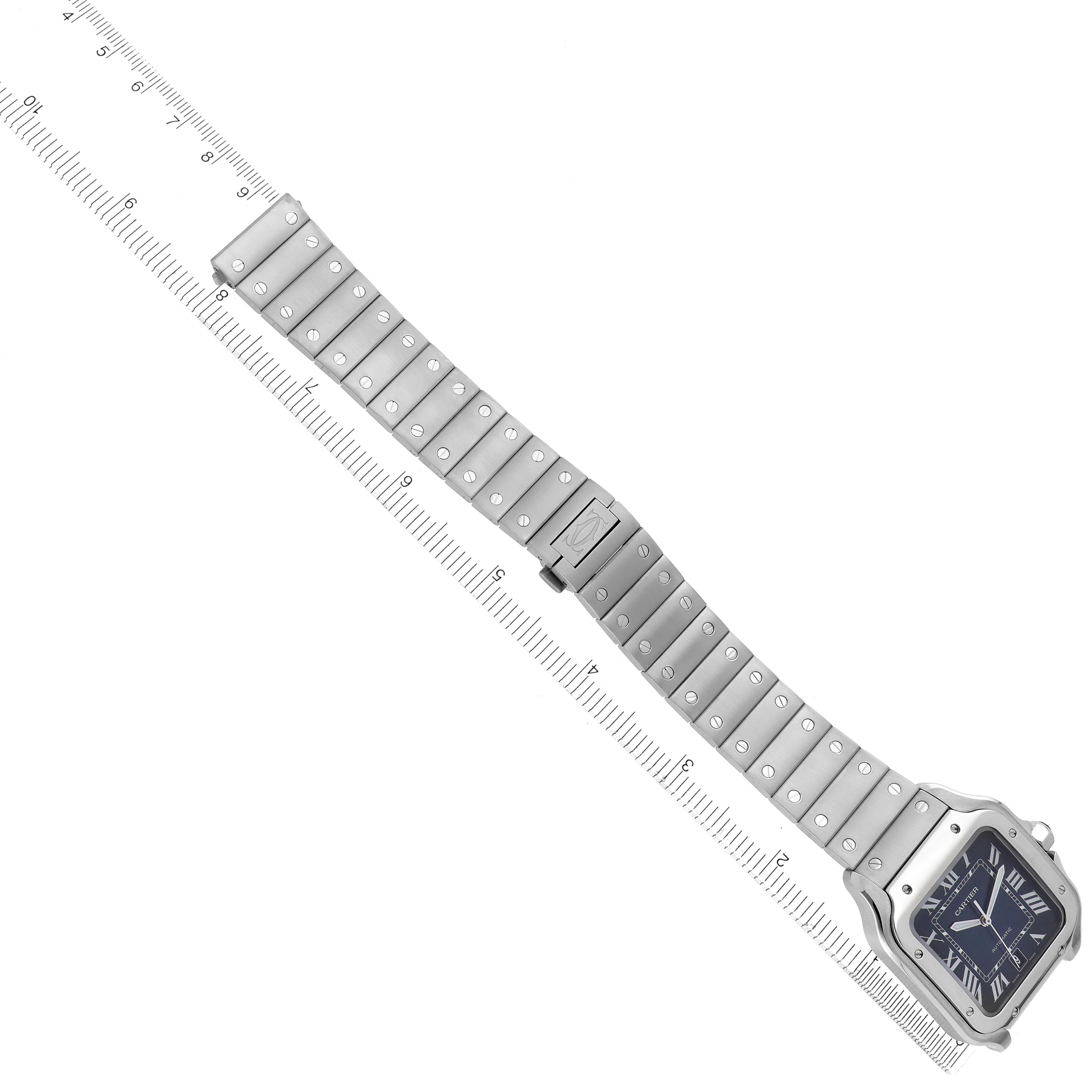 The Cartier Santos WSSA0030 Men
s Stainless Steel Blue Dial WSSA0030 Men
s Stainless Steel Blue Dial watch is shown from a diagonal angle, highlighting the full bracelet and watch face.