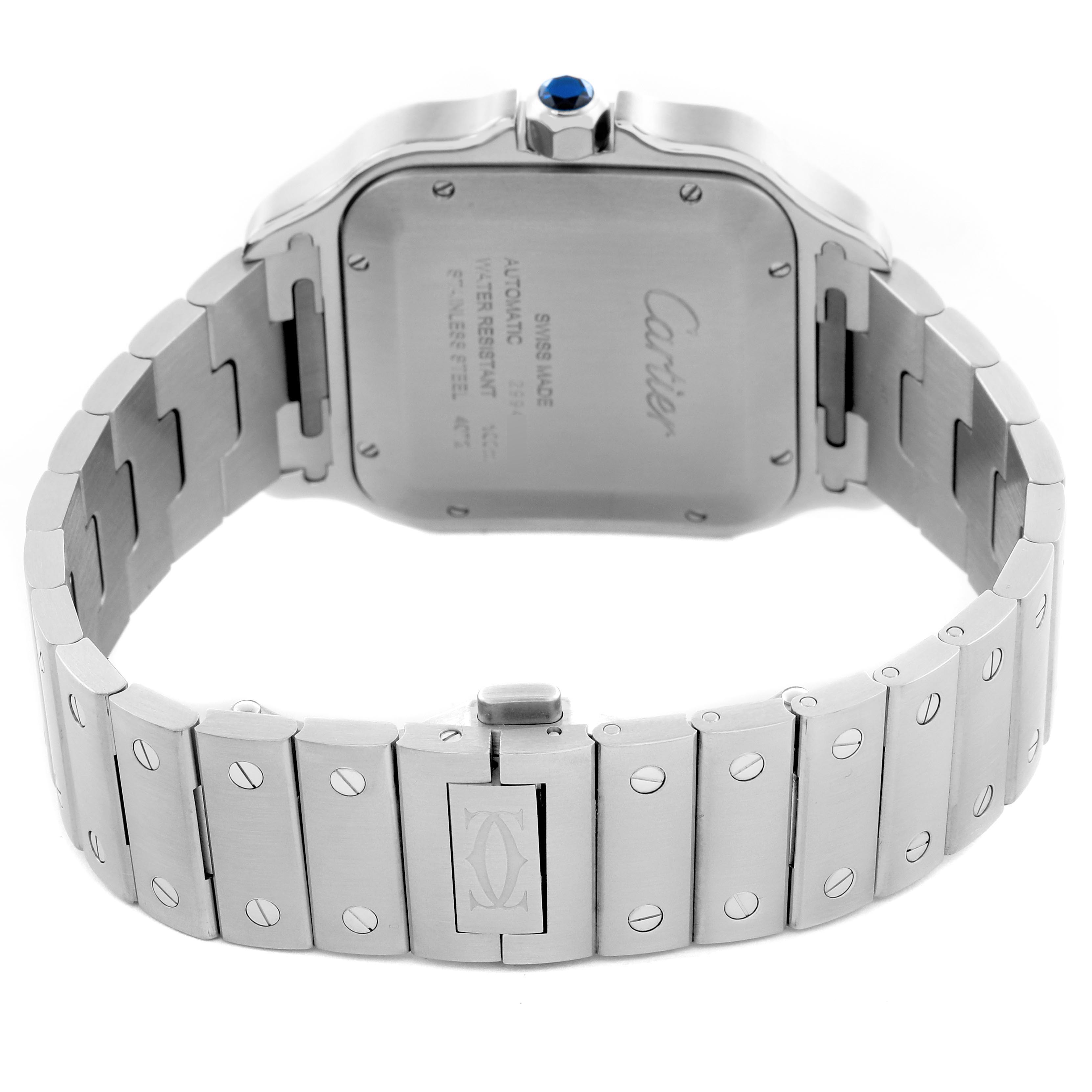 The image shows the back case and bracelet of a Cartier Santos WSSA0030 Men
s Stainless Steel Blue Dial WSSA0030 Men
s Stainless Steel Blue Dial watch with visible screws and a blue cabochon crown.