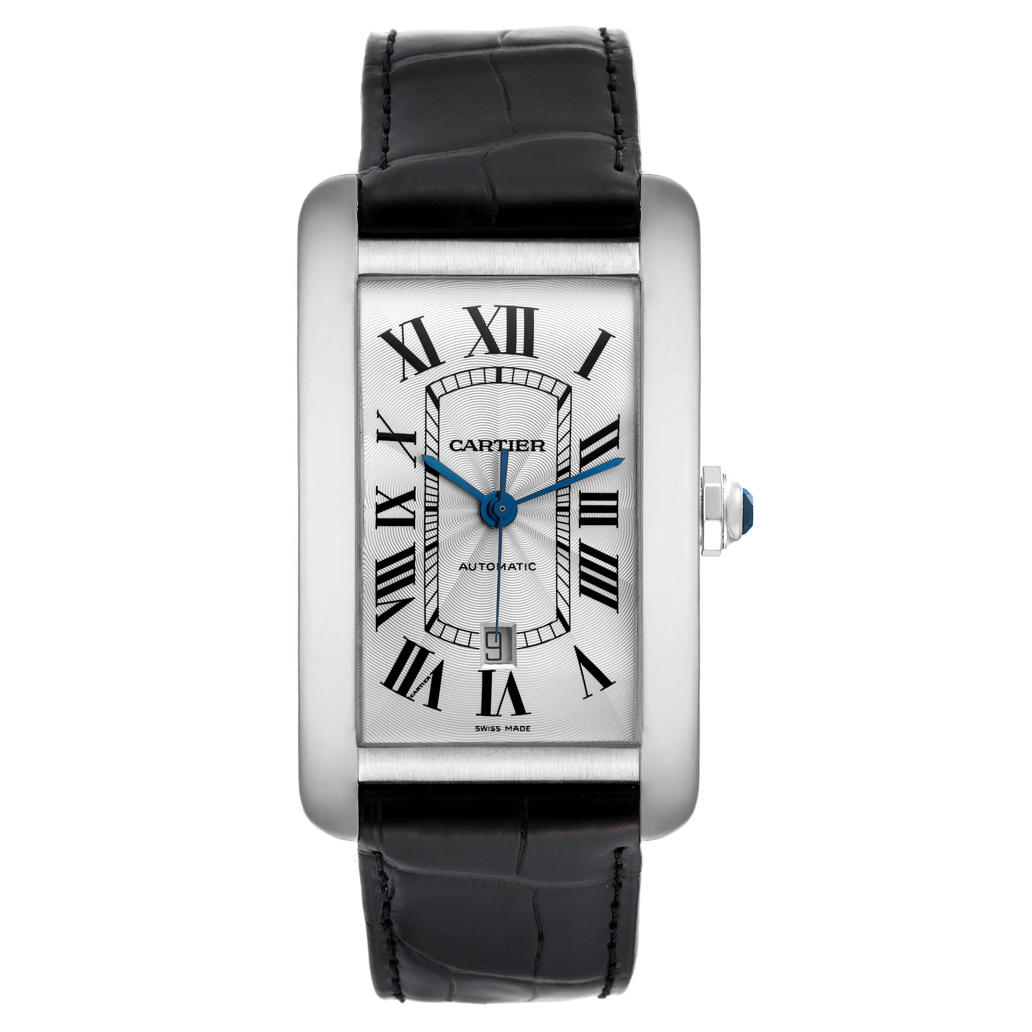 The image shows a front view of the Cartier Tank Americaine W2609956 Men's White Gold Silver Dial W2609956 Men's White Gold Silver Dial watch, highlighting its Roman numeral dial, blue hands, and black leather strap.