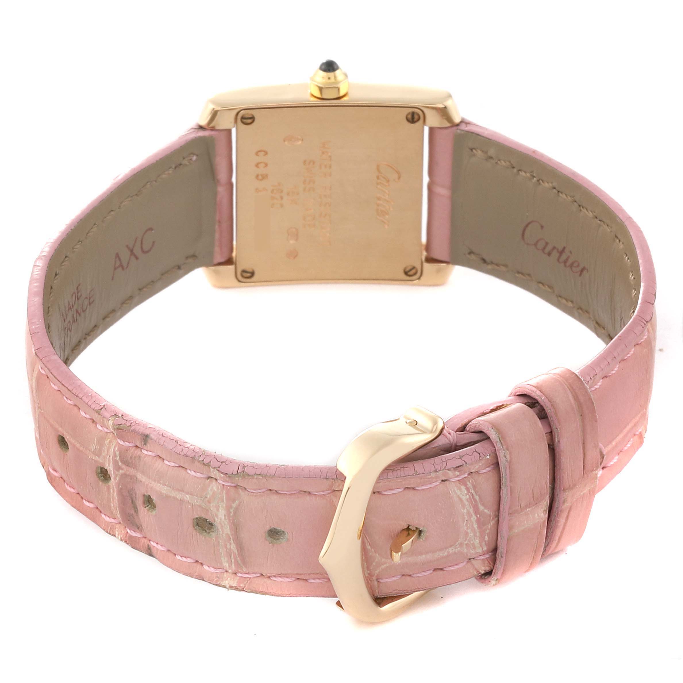 The image shows the back view of a Cartier Tank Francaise W5000256 Women
s Yellow Gold Silver Dial W5000256 Women
s Yellow Gold Silver Dial watch with a pink leather strap and gold buckle.