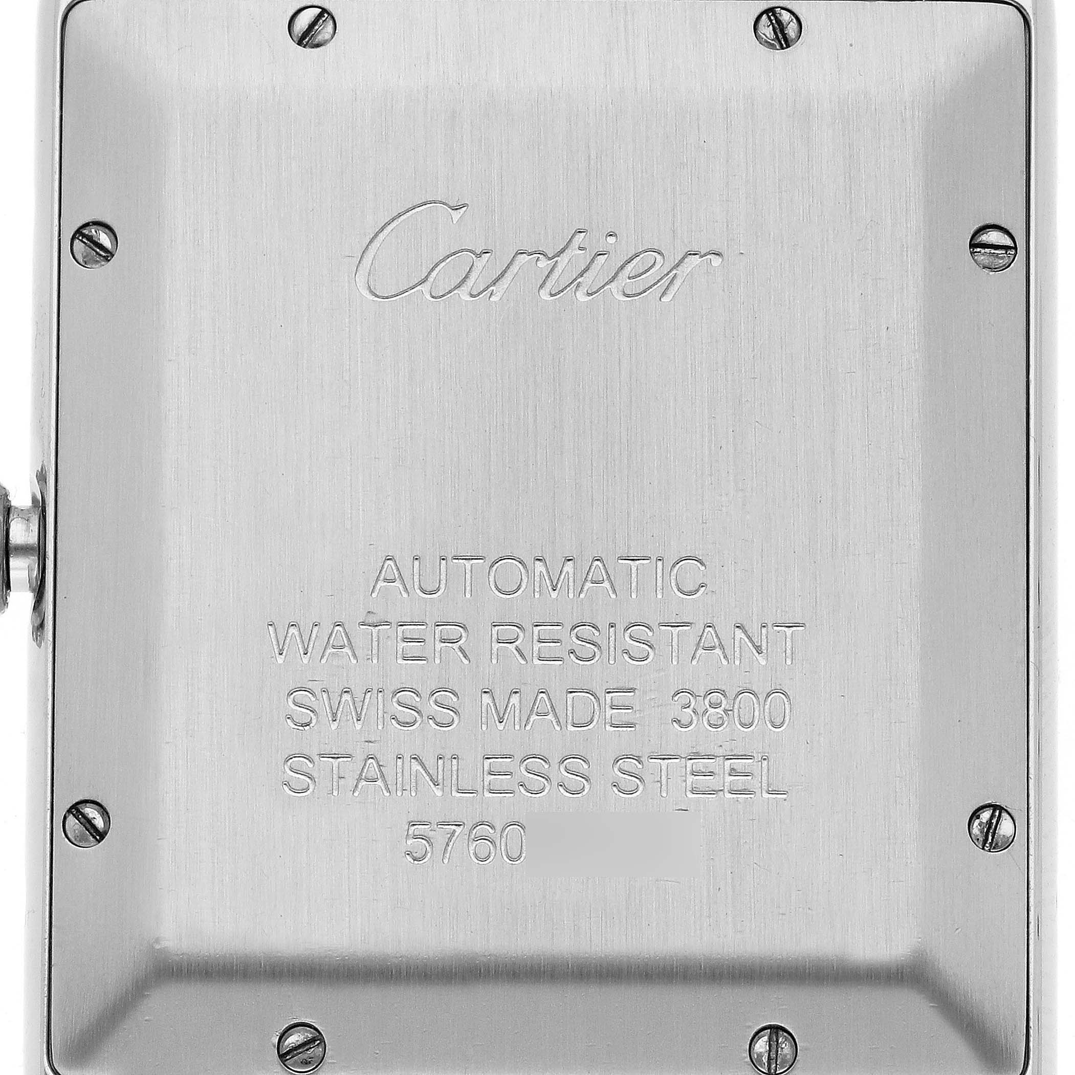 The image shows the back case of a Cartier Tank Solo W5200028 Men's Stainless Steel Silver Dial W5200028 Men's Stainless Steel Silver Dial watch, displaying engravings and screws.