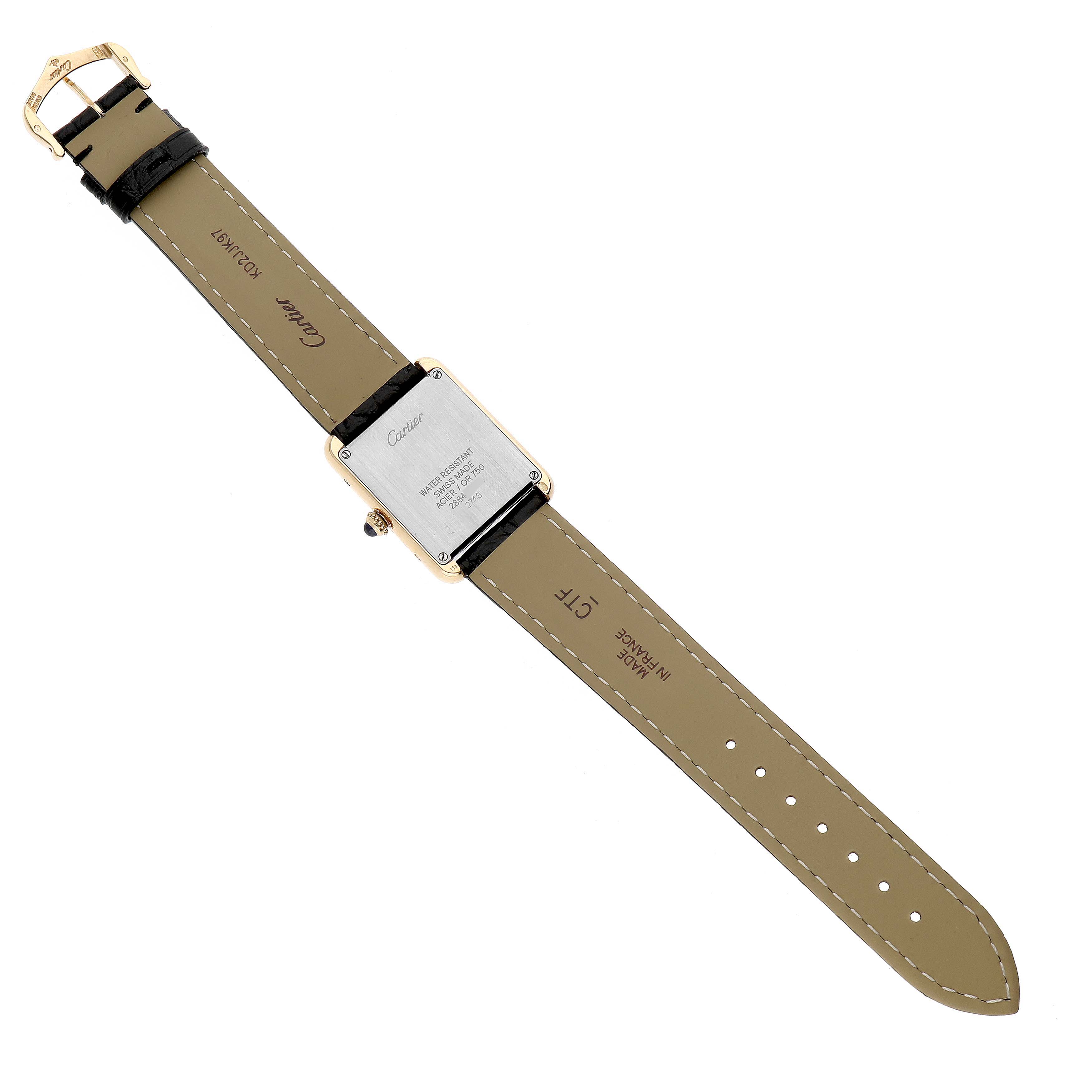 The Cartier Tank Solo W1018755 Women's Yellow Gold Silver Dial watch is shown from the back, depicting the case back and both straps.