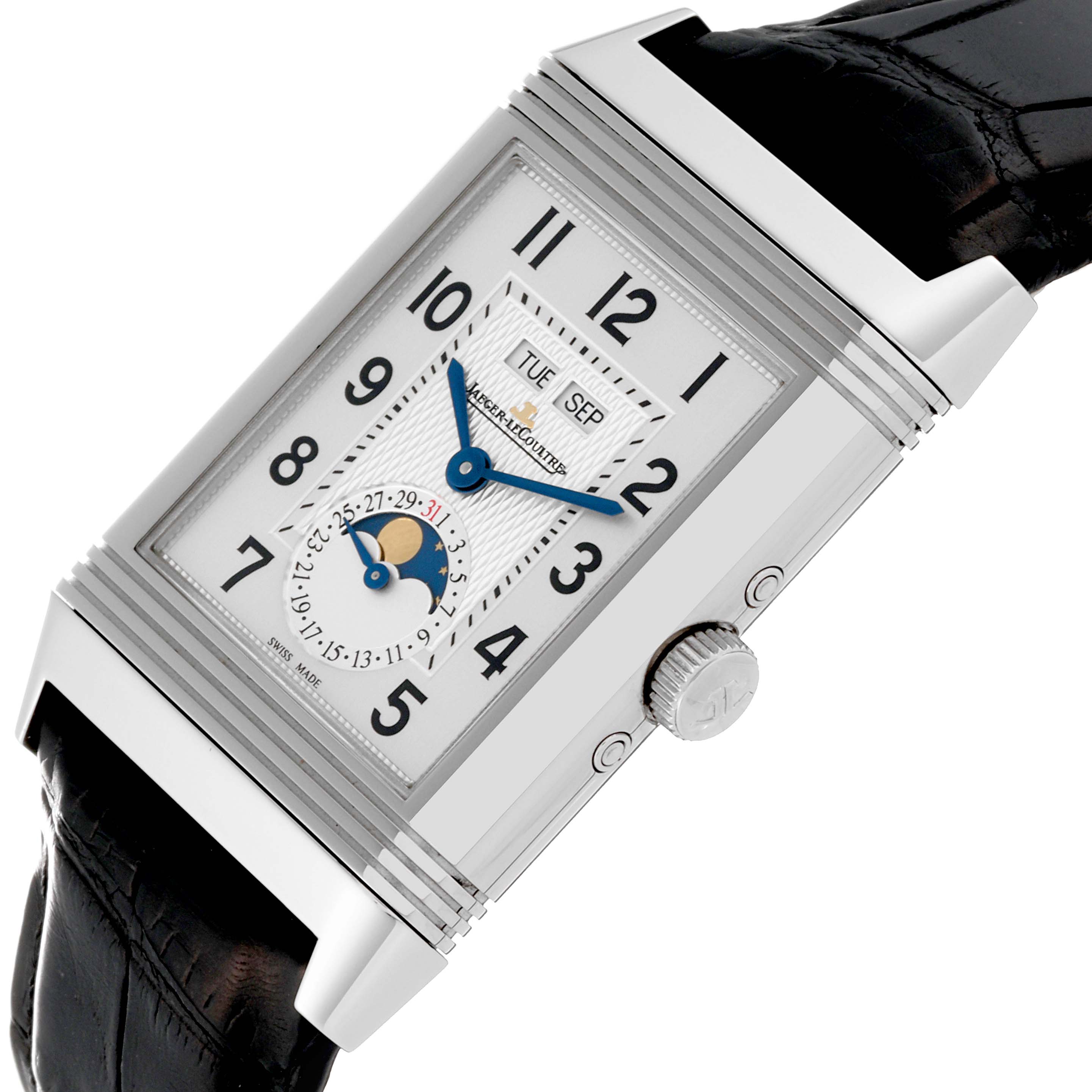 This image shows a Jaeger LeCoultre Reverso Q3758420 Men's Stainless Steel Silver Dial Q3758420 Men's Stainless Steel Silver Dial watch at an angle, displaying its dial, crown, and part of the leather strap.