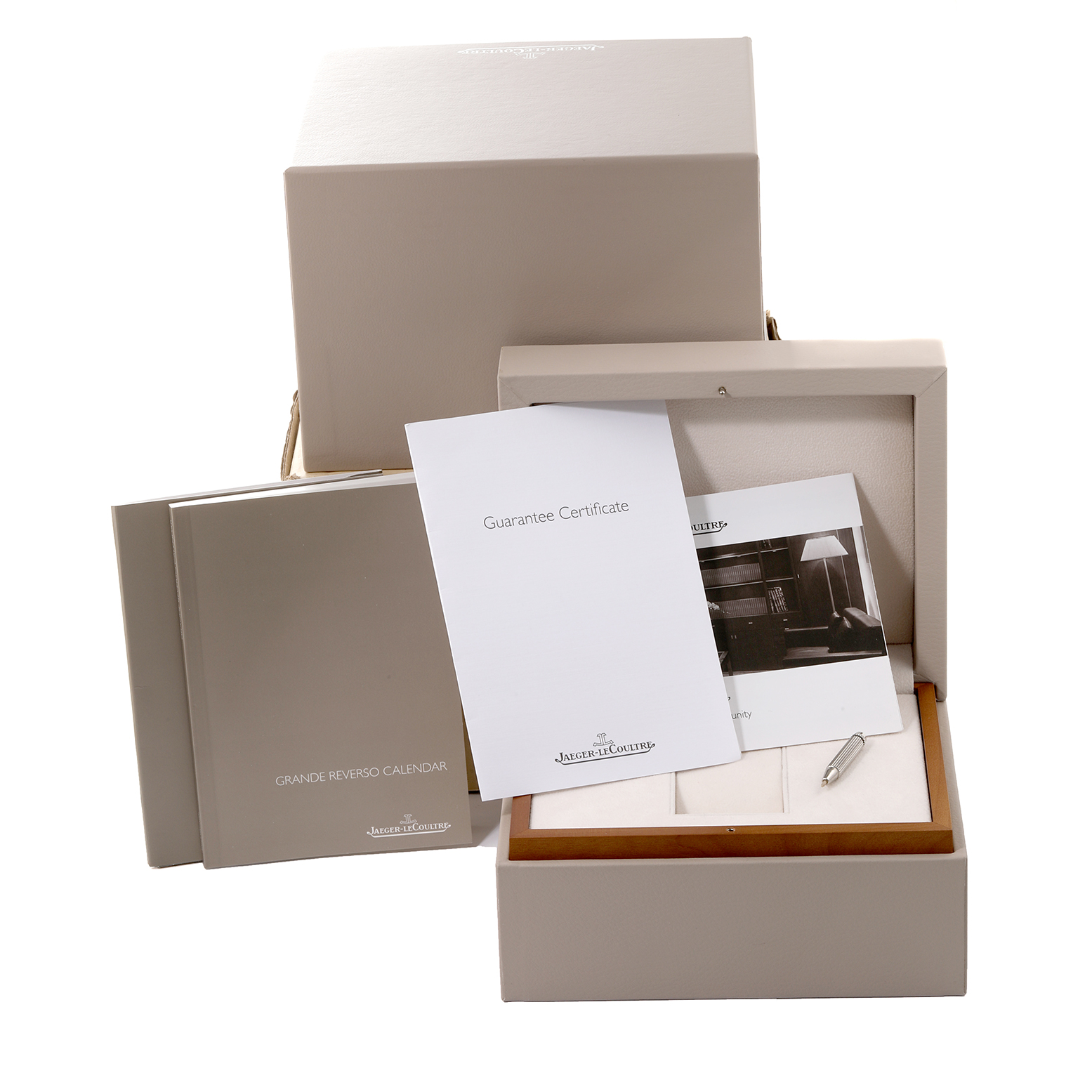 The image shows the box, guarantee certificate, booklets, and accessories for the Jaeger LeCoultre Reverso Q3758420 Men's Stainless Steel Silver Dial Q3758420 Men's Stainless Steel Silver Dial watch model.