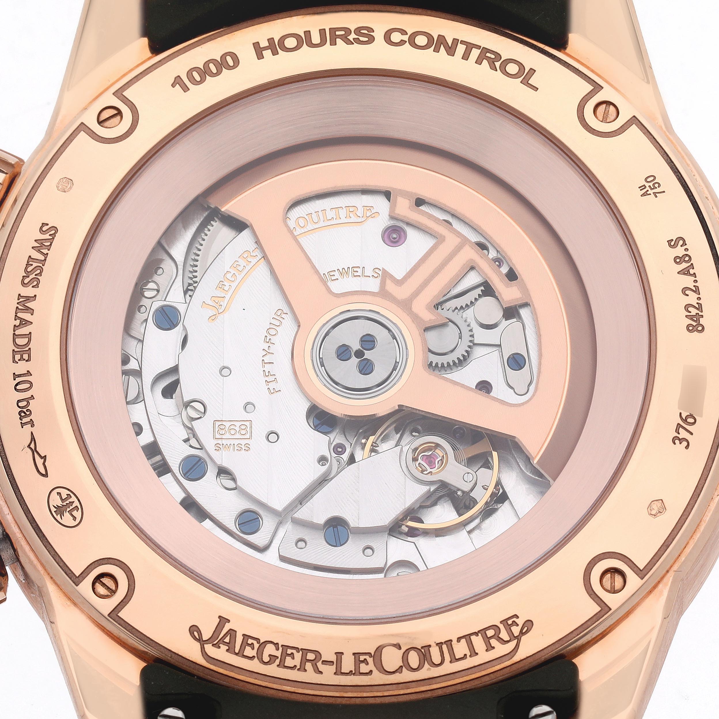 The image shows the back view of the Jaeger LeCoultre Polaris Q908263J/842.2.A8.S Men
s Rose Gold Green Dial Q908263J/842.2.A8.S Men
s Rose Gold Green Dial watch, highlighting its movement mechanisms and engravings.
