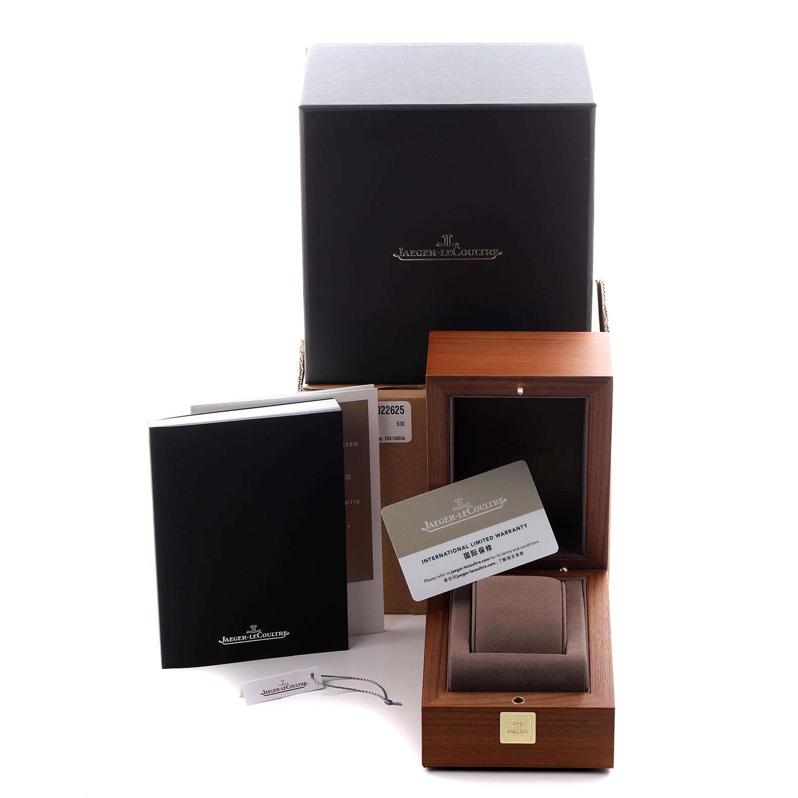 The image shows the packaging and accessories for the Jaeger LeCoultre Polaris Q908263J/842.2.A8.S Men
s Rose Gold Green Dial Q908263J/842.2.A8.S Men
s Rose Gold Green Dial, including boxes, booklets, and a warranty card.