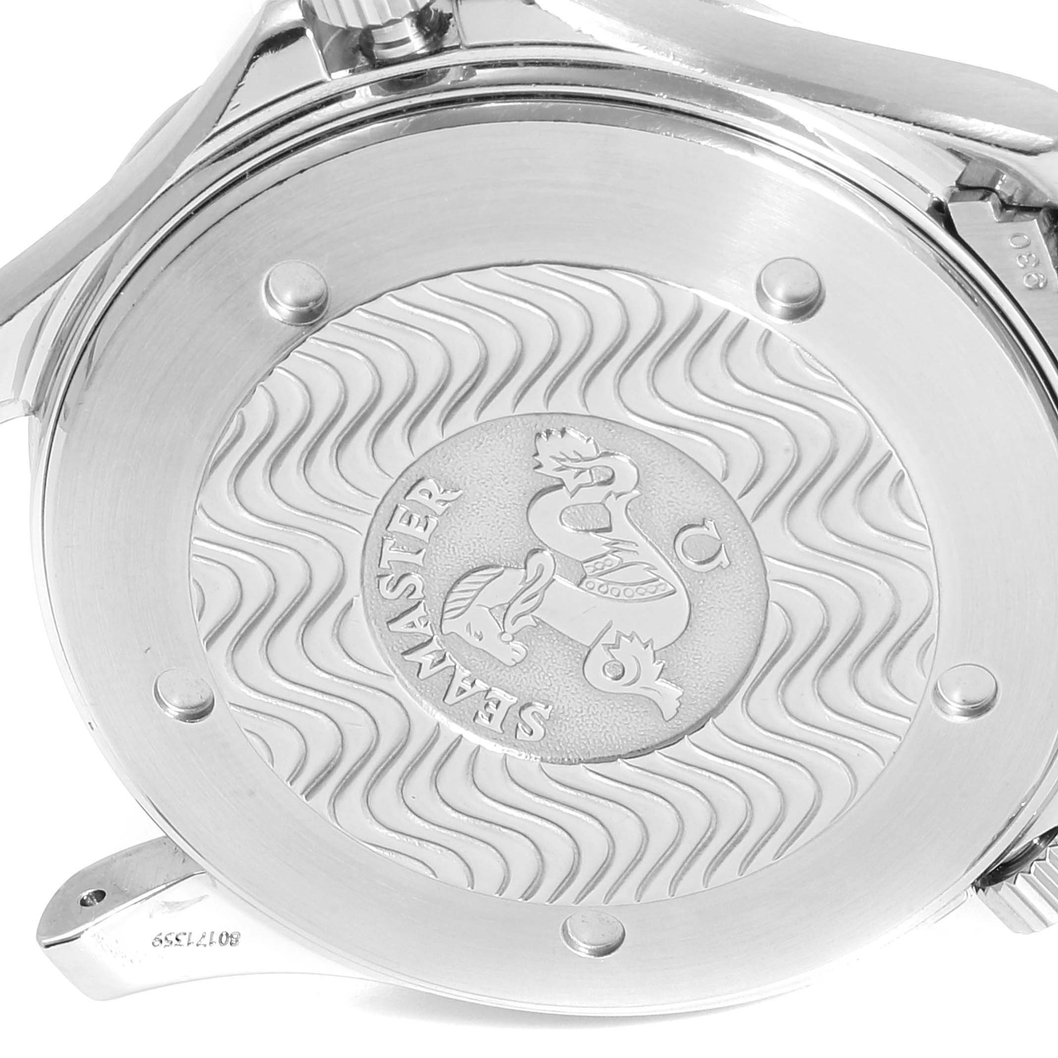 The image shows the case back of an Omega Seamaster 2255.80.00 Men
s Stainless Steel Blue Dial 2255.80.00 Men
s Stainless Steel Blue Dial watch, highlighting its engravings and wave pattern.