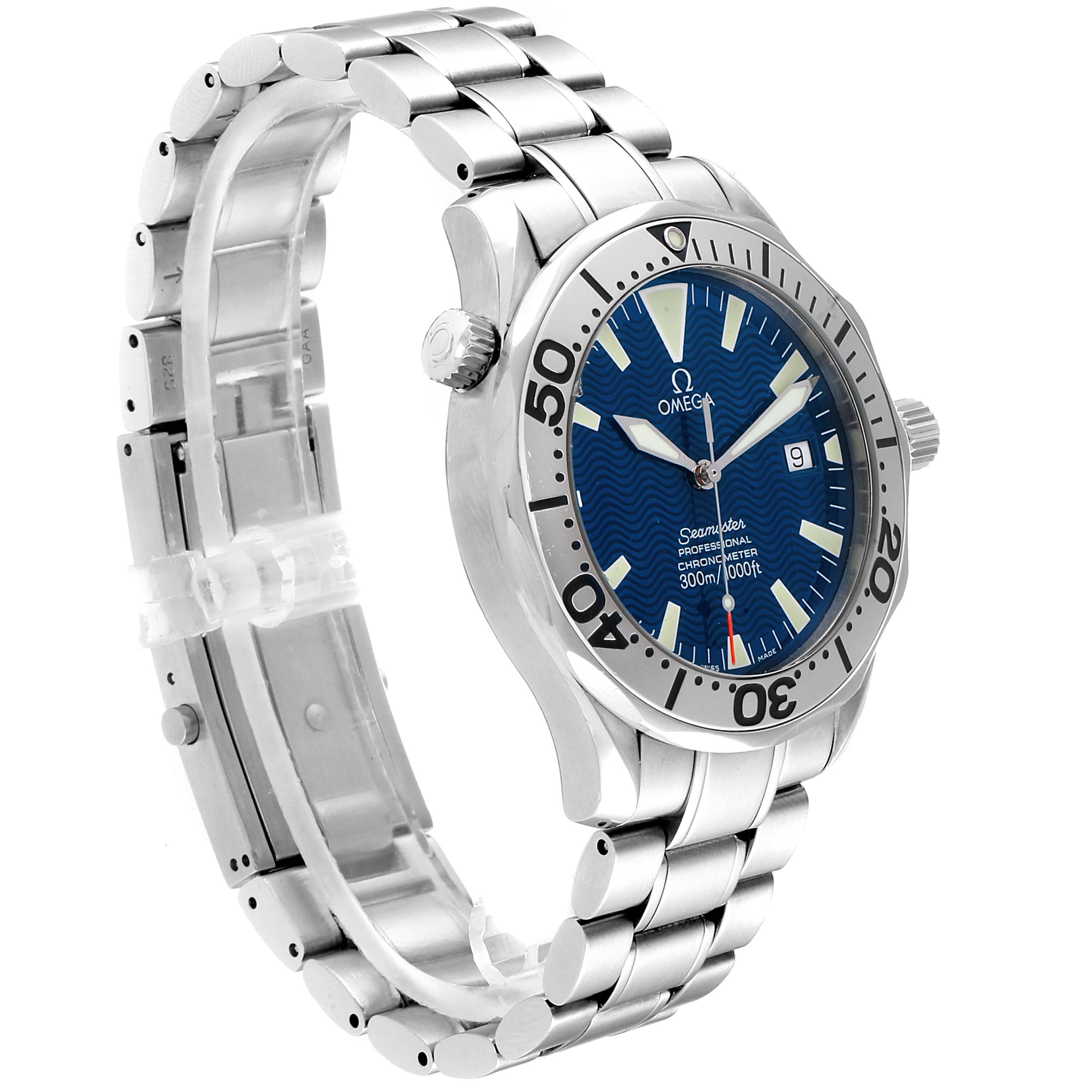 The image shows a side angle of the Omega Seamaster 2255.80.00 Men
s Stainless Steel Blue Dial 2255.80.00 Men
s Stainless Steel Blue Dial watch, highlighting its blue dial, bezel, and metal bracelet.