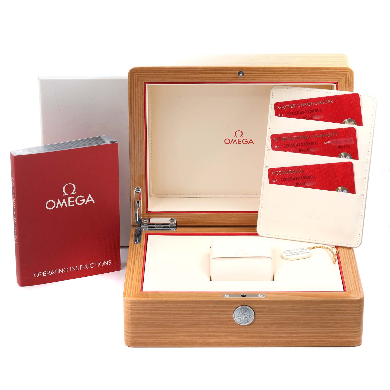 This image shows an open wooden box, documents, and cards for the Omega Aqua Terra 220.10.41.21.06.001 Men
s Stainless Steel Grey Dial 220.10.41.21.06.001 Men
s Stainless Steel Grey Dial watch.