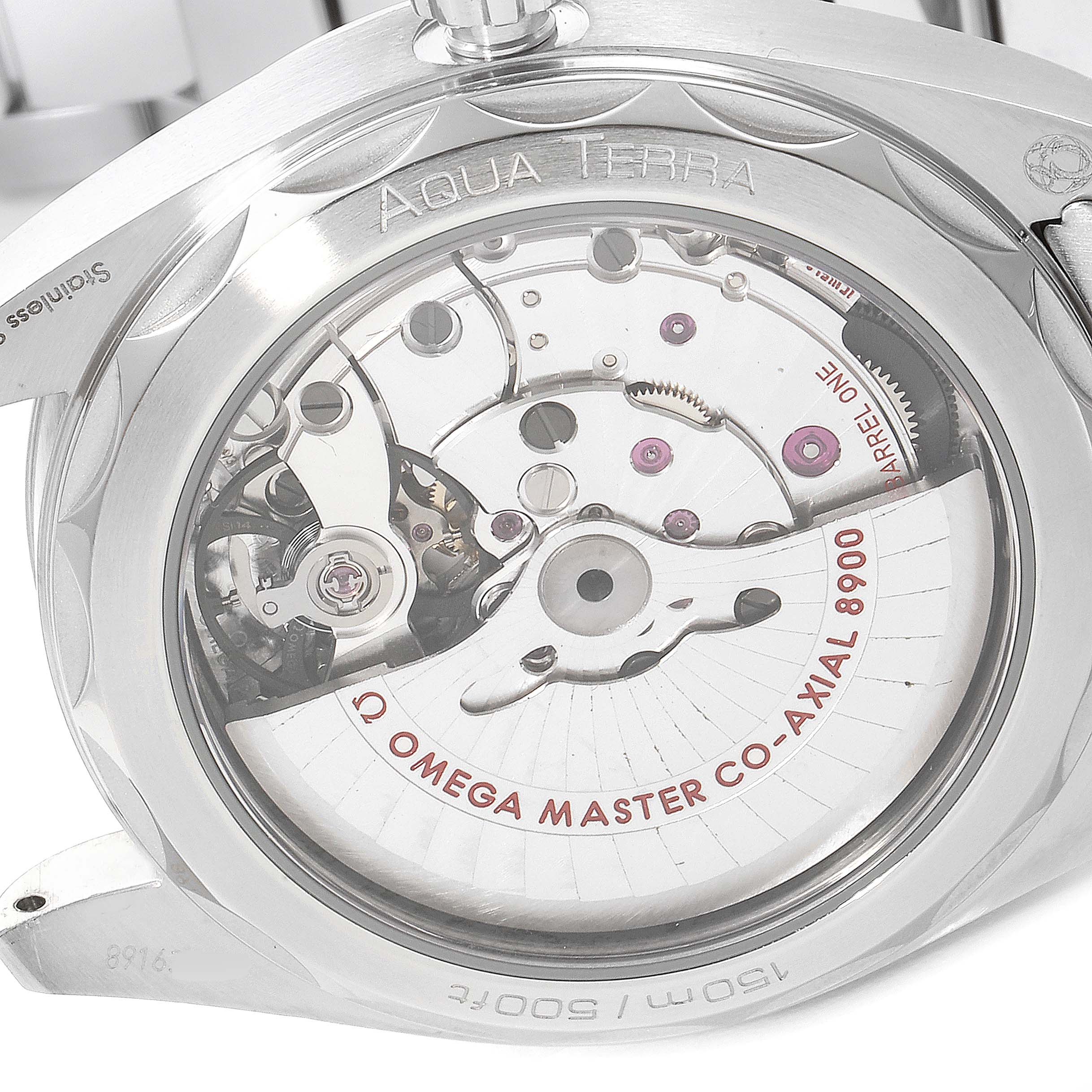 The image shows the back of the Omega Aqua Terra 220.10.41.21.06.001 Men
s Stainless Steel Grey Dial 220.10.41.21.06.001 Men
s Stainless Steel Grey Dial watch, highlighting the movement mechanism and engravings.