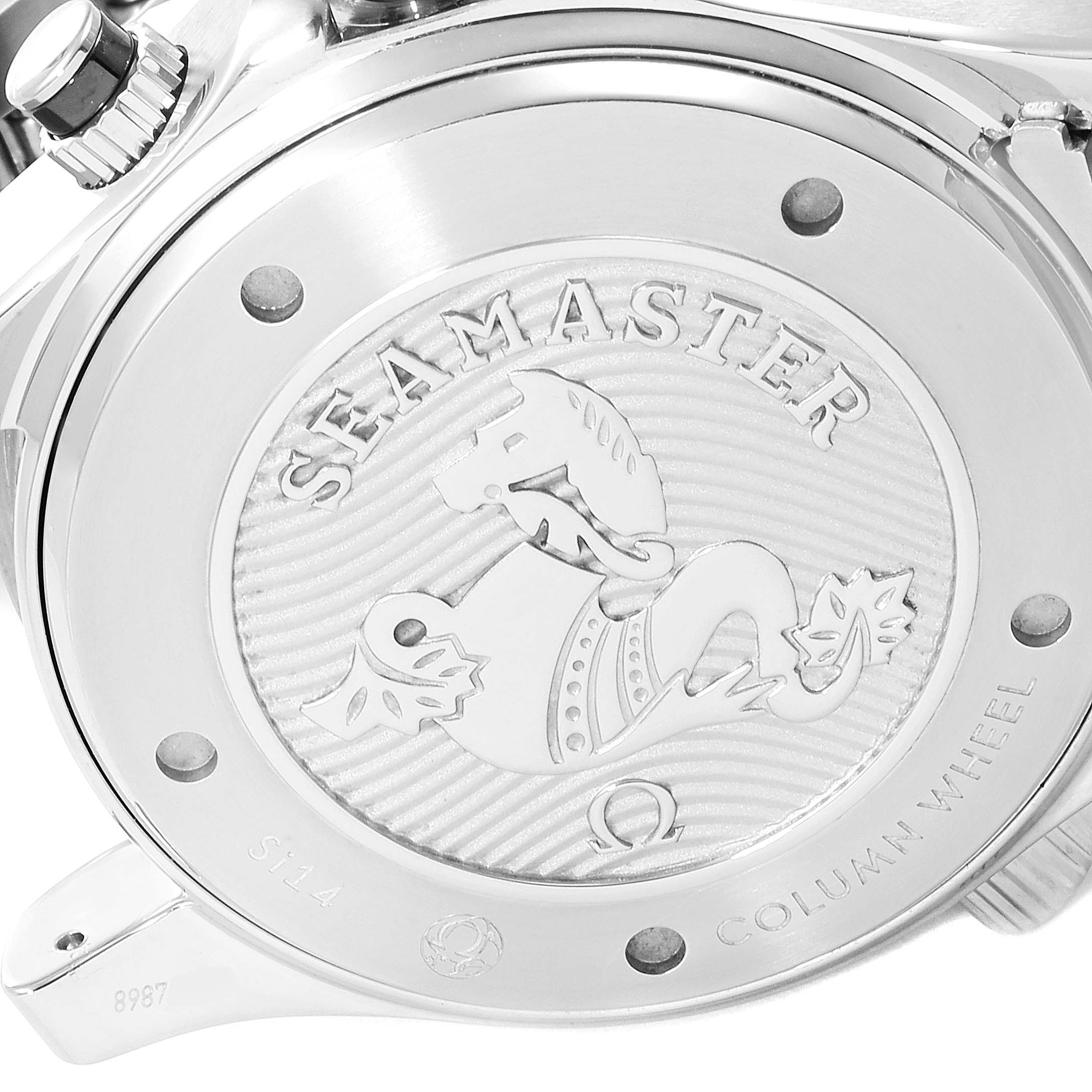 The image shows the back case of an Omega Seamaster 212.30.44.50.01.001 Men
s Stainless Steel Black Dial 212.30.44.50.01.001 Men
s Stainless Steel Black Dial watch, highlighting its engraved details and textured design.