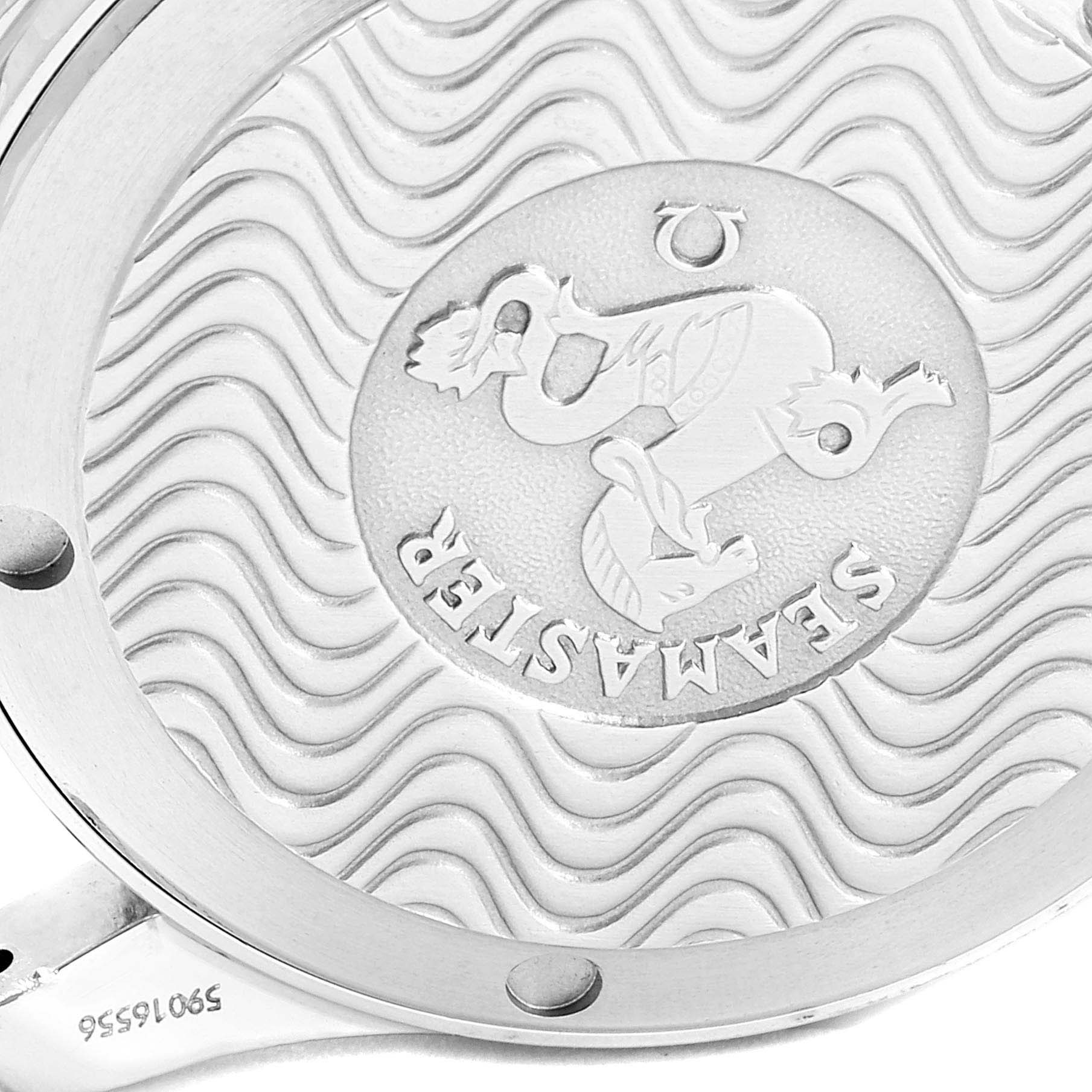 This is a close-up angle of the back case of an Omega Seamaster 2561.80.00 Men
s Stainless Steel Blue Dial 2561.80.00 Men
s Stainless Steel Blue Dial watch, showing its engraved logo and decorative pattern.